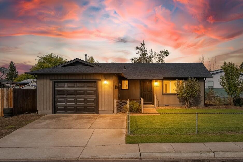 Beautifully updated 3-bedroom ranch-style home on a low-maintenance 0.14-acre lot. Recent improvements include a new HVAC system, new water heater, new gutters, new interior and exterior paint, new carpet in bedrooms, new kitchen appliances, and a new electrical panel. The roof is newer, and durable plank laminate flooring extends through the main living areas. The bright kitchen features white cabinetry and stainless-steel appliances. A new sliding glass door leads to a covered back patio overlooking the fenced yard—ideal for pets, gardening, or outdoor dining. The attached one-car garage provides additional storage and convenience. Located in a quiet White City neighborhood close to schools, parks, and local amenities. Qualifies for 100% financing and has modest property taxes of only $2,068 per year. One owner is a licensed real estate broker in the State of Oregon.