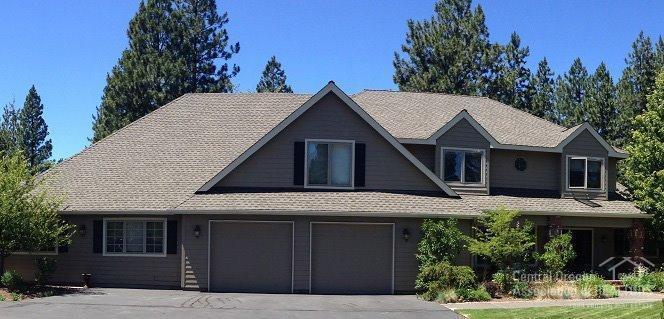 This is a beautiful home tucked in the back of Woodside Ranch and backing to public lands. Set off the street on a serene 2.21 acres dotted with ponderosas and junipers, this estate is quiet and peaceful. An extensive remodel of the downstairs gives the home an old colonial feel with top end amenities. Mt Bachelor is framed perfectly from the kitchen and backyard. The deck stretches across the length of the home out back. For horse lovers, this property is perfect with a back gate adjoining public lands.