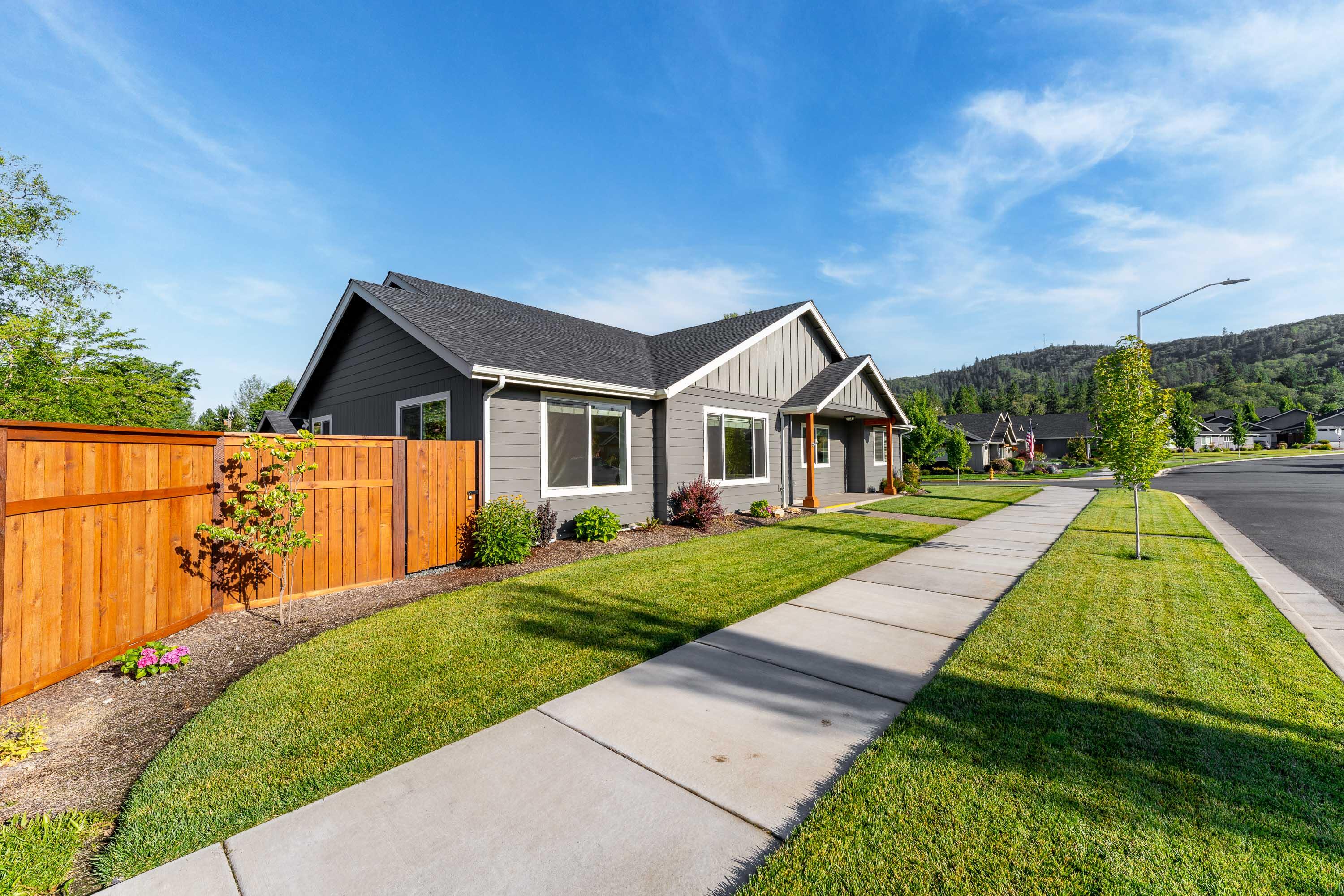 Immaculate, like new, and ready to move in! This single level beauty sits on a prestigious corner in the coveted Capitol Hill Subdivision. Built in 2021. Close to all city services, All Sports Park and school, this home features 3 bedroom, 2 baths, split floor plan and soaring ceilings. The open concept is very welcoming as are the engineered wide plank wood floors. The kitchen is design perfect with granite counters, stainless appliances and a large eating bar, as well as the ''coffee station'' built in. There is an ample dining area and off the kitchen there is a covered porch for entertaining. The primary bedroom is large with a beautiful primary bath and large walk in closet. Great laundry room. Finished 2 car garage and low maintenance landscaping front and rear. Don't wait to view this one....you will be pleasantly surprised!