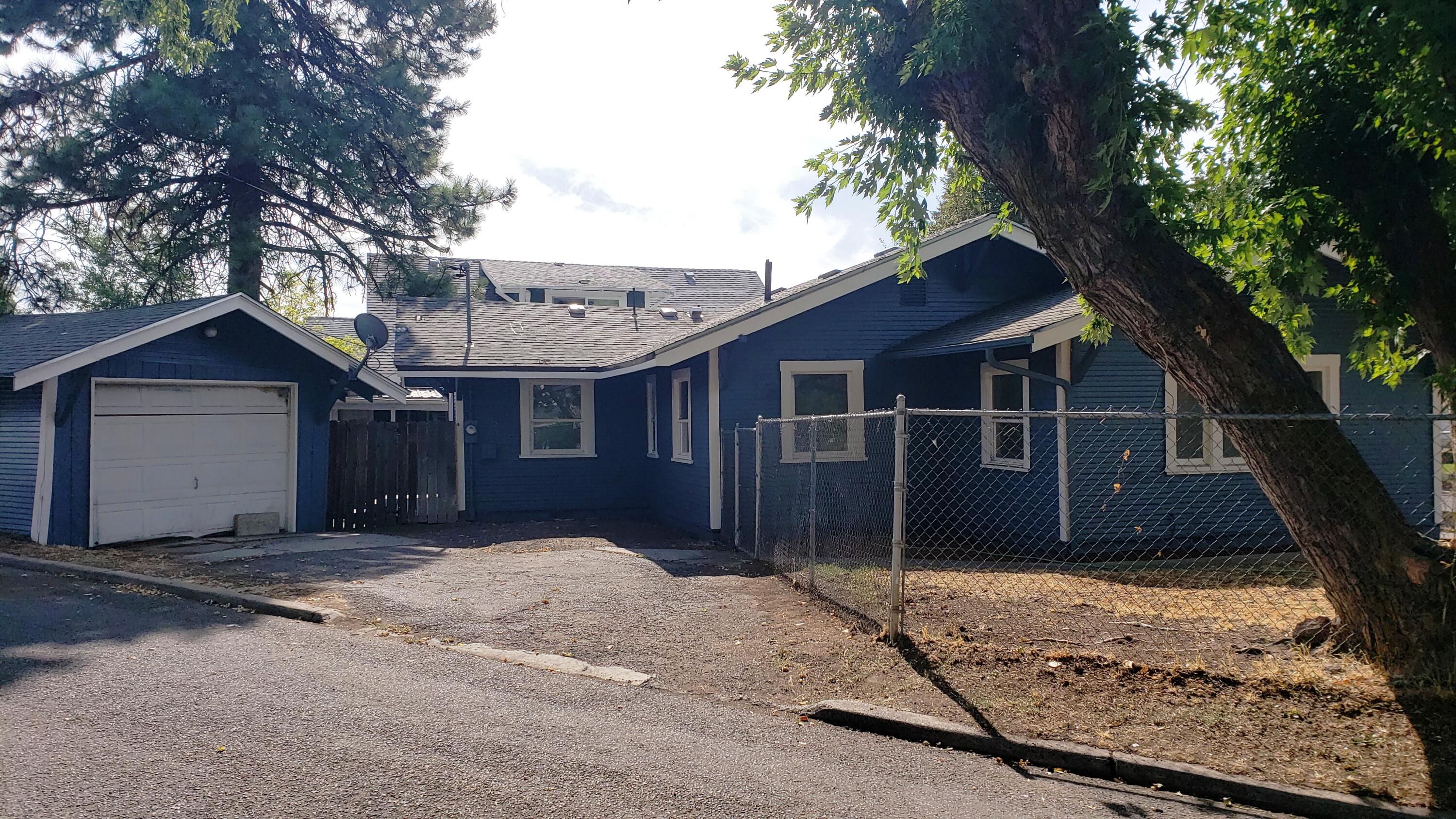 Nicely redone 3 bed 1 bath home with detached garage. Third bedroom has French doors and could be an office, den, dining room etc. This home has much of the original character with French doors for the 3rd bedroom. Built-ins kitchen cabinets have glass windows., new laminate flooring, new paint in and out.