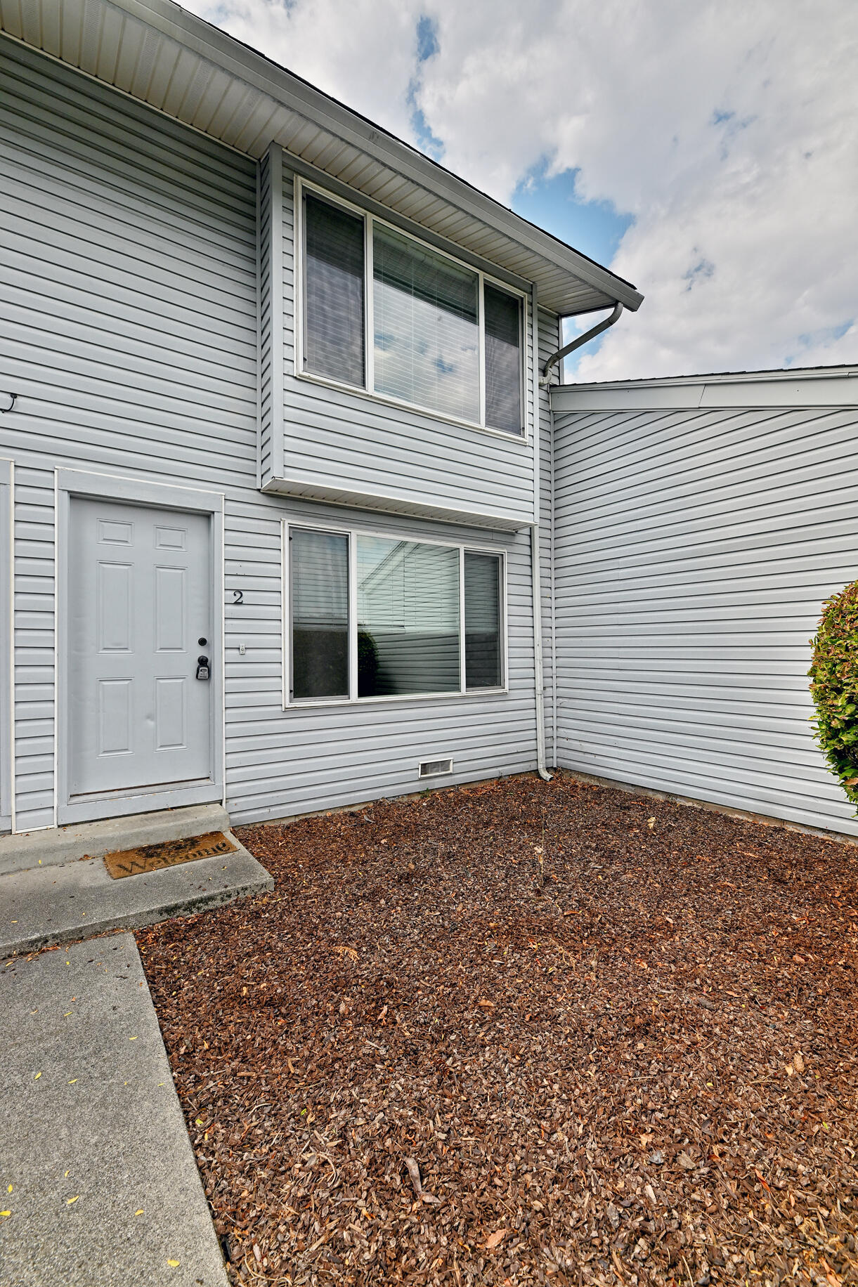Beautifully Updated Condo in Desirable East Medford! This move-in ready 2 bed, 2 bath condo offers 905 sq ft of stylish and functional living space in one of East Medford's most sought-after locations. Nearly $20,000 in thoughtful upgrades, including luxury vinyl plank flooring (installed just 3 years ago), updated kitchen, newer washer and dryer, new bathroom vanities and insert, fresh carpet, and low-maintenance landscaping with woodchips in the front and back. Enjoy worry-free living with an HOA that covers water, sewer, trash, landscaping, and exterior maintenance. Whether you're a first-time buyer, downsizing, or looking for an investment opportunity, this well-maintained home is a rare find in today's market. Don't miss your chance to own a beautifully updated condo in a prime location!