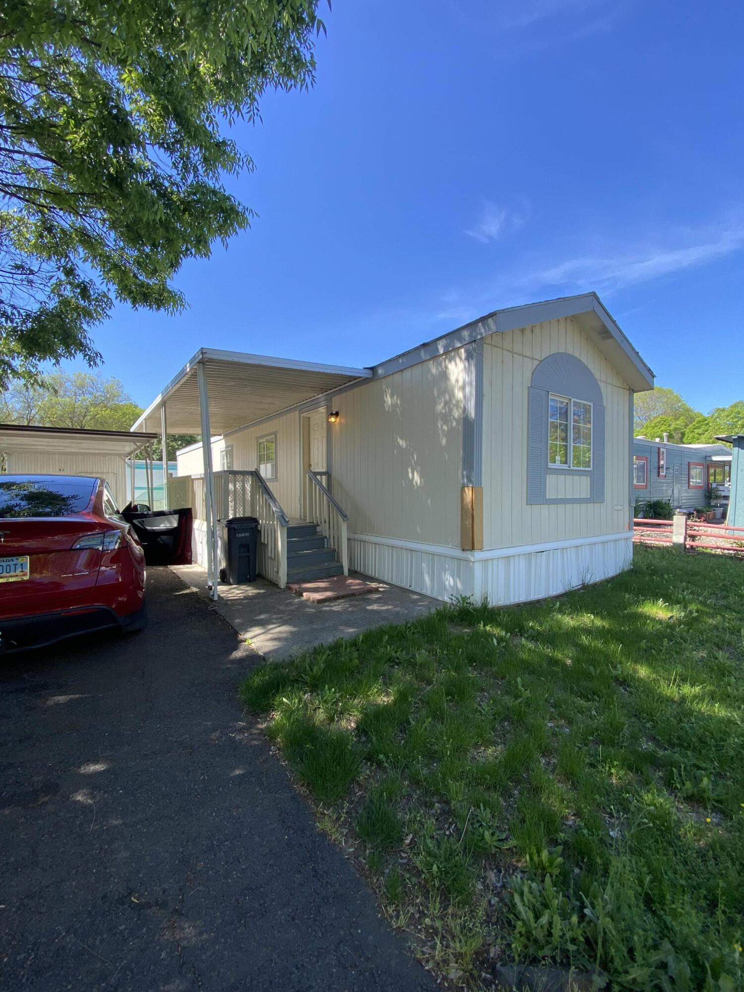 Seller will pay $1,000 towards Buyers Interest Rate Buydown at closing! Welcome to Space #63 located within the esteemed Rogue Valley Meadows, a 55+ community in the heart of Medford. This single-wide mobile home offers 2bd, 1 bth and 784 square feet of comfortable living space. Flooring has been updated and is ready for a new owner! Built in 1995, the bones are solid and home is move in ready. Park covers water, sewer and garbage. Owners pay for electricity. Available for a showing anytime. New owners must be approved by RVM with attached application.