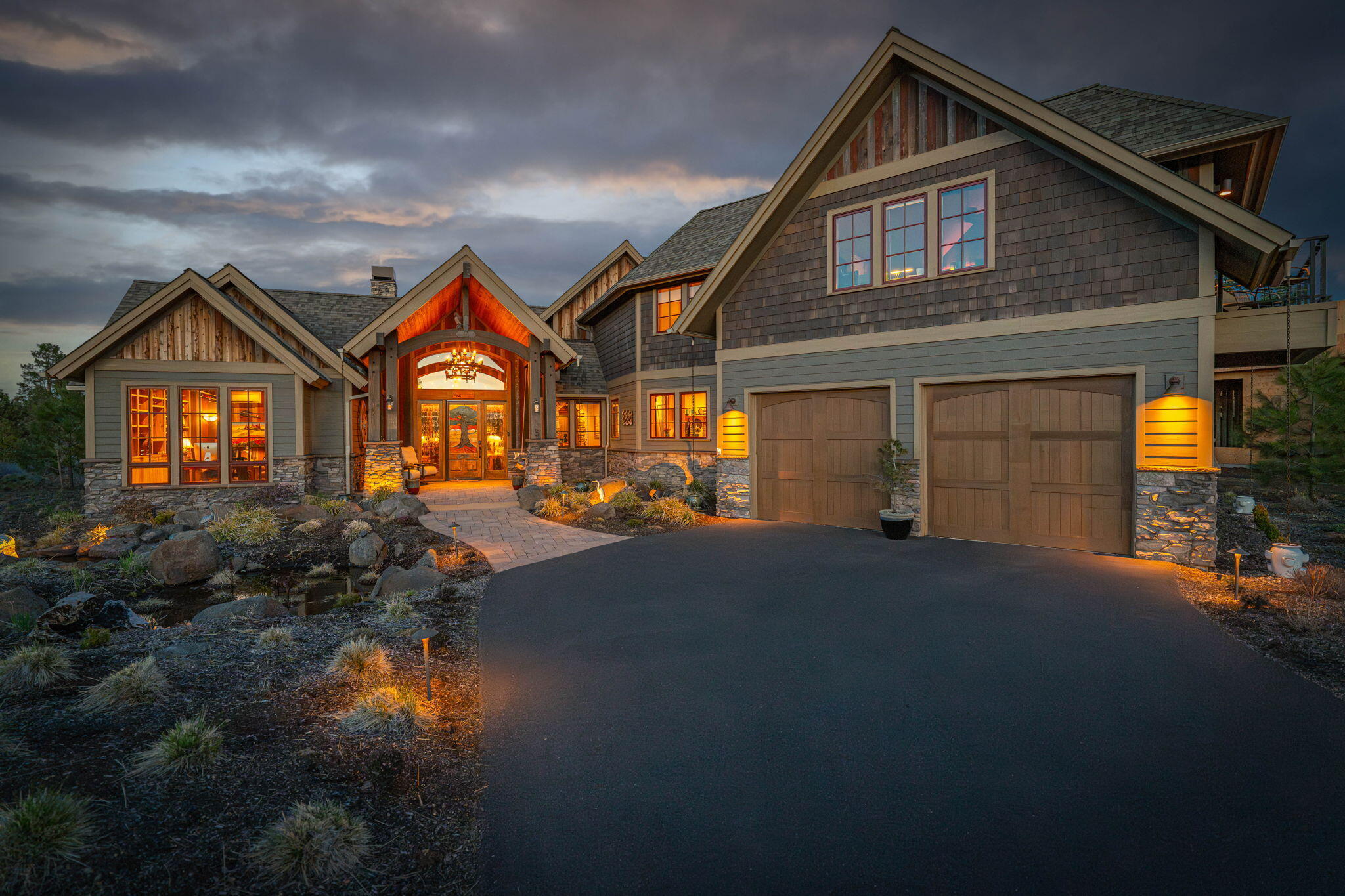 Discover the exceptional lifestyle offered by this custom-built residence nestled within the prestigious Tetherow community. Situated on the15th fairway, the home presents breathtaking, unobstructed views of the golf course, pond and mountains. Inside, experience a warm and inviting atmosphere. Soaring vaulted ceilings adorned with custom woodwork create a sense of spacious elegance. The gourmet kitchen is a culinary haven, featuring sleek granite countertops, high-end SS appliances, walk-in pantry, and a substantial island perfect for gatherings. Seamless indoor-outdoor living is achieved through expansive windows and sliding doors that perfectly frame the picturesque golf course. This meticulously designed home showcases an array of luxurious amenities and thoughtful details, including smart home automation and energy-efficient solar panels. The main floor offers a primary suite and a home office. Upstairs has two comfortable bedrooms and a bonus room with amazing Cascade views.