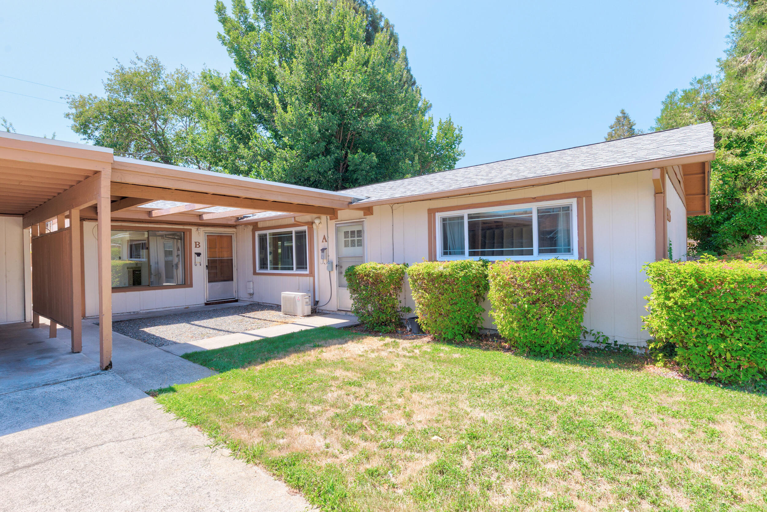 This well-maintained duplex offers two 828 sqft units, each with 2 bedrooms, 1 bathroom, and laundry hookups. Unit A is in excellent condition and currently occupied by a reliable long-term tenant. Unit B has been updated with new flooring, fresh paint, and beautiful granite countertops — and is vacant for easy showing. Property features a double carport with storage closets and fully fenced backyards for each unit. Great investment opportunity or live in one side and rent the other!