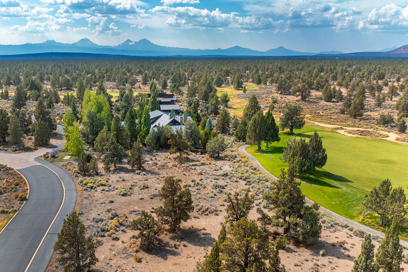 Located mid-hole on Fazio #5, with additional views of the #6 lake and fairway and the Cascade Mountains, this premier homesite offers a flat building site ready for your dream home. Nestled within an ancient juniper forest, the Estates of Pronghorn at Juniper Preserve combine natural beauty with world-class recreation. With the award-winning Fazio and Nicklaus courses just outside your door, golf is part of everyday life in this remarkable setting. Within Juniper Preserve, residents enjoy exclusive amenities including dining, spa, fitness and wellness centers, pools, hot tubs, pickleball, a dog park and scenic trails. Beyond the gate lies the vibrant mountain town of Bend, offering culture, dining, and endless outdoor adventure. From skiing and biking to music, art, and craft breweries, the best of Central Oregon is at your doorstep. Here, lifestyle and location come together in a private community unlike anywhere else. Pronghorn Membership is required and not included with the sale.
