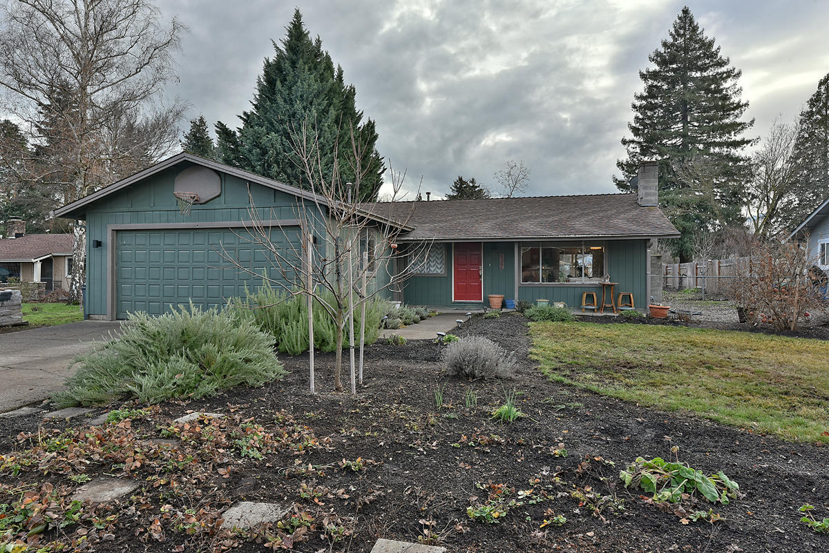 Updated home in secluded cul-de-sac sitting on a third of an acre in a great location of Medford! This 3 bedroom, 2 bathroom home has newer flooring throughout with a nice, open layout and a 2 car garage. Equipped with a fireplace, the cozy living room offers plenty of space and natural light leading into a charming dining room and kitchen. The slider off the kitchen opens to an incredibly spacious backyard with a partially covered patio, a variety of different fruit trees/plants, a chicken coop and plenty of space on either side of the home perfect for a shed or boat/RV parking! All bedrooms are good sized with a shared hall bath that has a tub/shower and a single sink vanity with the spacious master suite including a stall shower and single sink vanity. This home offers plenty of possibilities! Please text listing agent to make an appointment today!