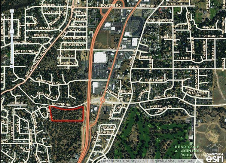 This development parcel is located on South Highway 97 and fronts the Murphy Road extension to Brookswood Blvd. Ideally located to serve the fastest growing neighborhoods in Bend, the site has excellent access to the Parkway via the Murphy Road roundabout, overpass, and ramp. Residential development in southwest and southeast Bend has outstripped commercial services. The split commercial, mixed-use, and multi-family zoning is extremely flexible and would allow a combination of retail, medical, office, hotel,&nbsp;<span style=font-size: 10pt;>restaurant, and multi-family residential. Near Wal-Mart, Nike, Bend Factory&nbsp;</span><span style=font-size: 10pt;>Outlet Stores, Pioneer Crossing, and the new St. Charles Medical Clinic. T</span>he site could be combined with 2 adjacent parcels to the south: the WinCo Parcel (16.37 acres) and the<br>Oregon Department of Transportation Parcel (17.41 acres) allowing the developer the ability to create a master planned community on over 48 acres of