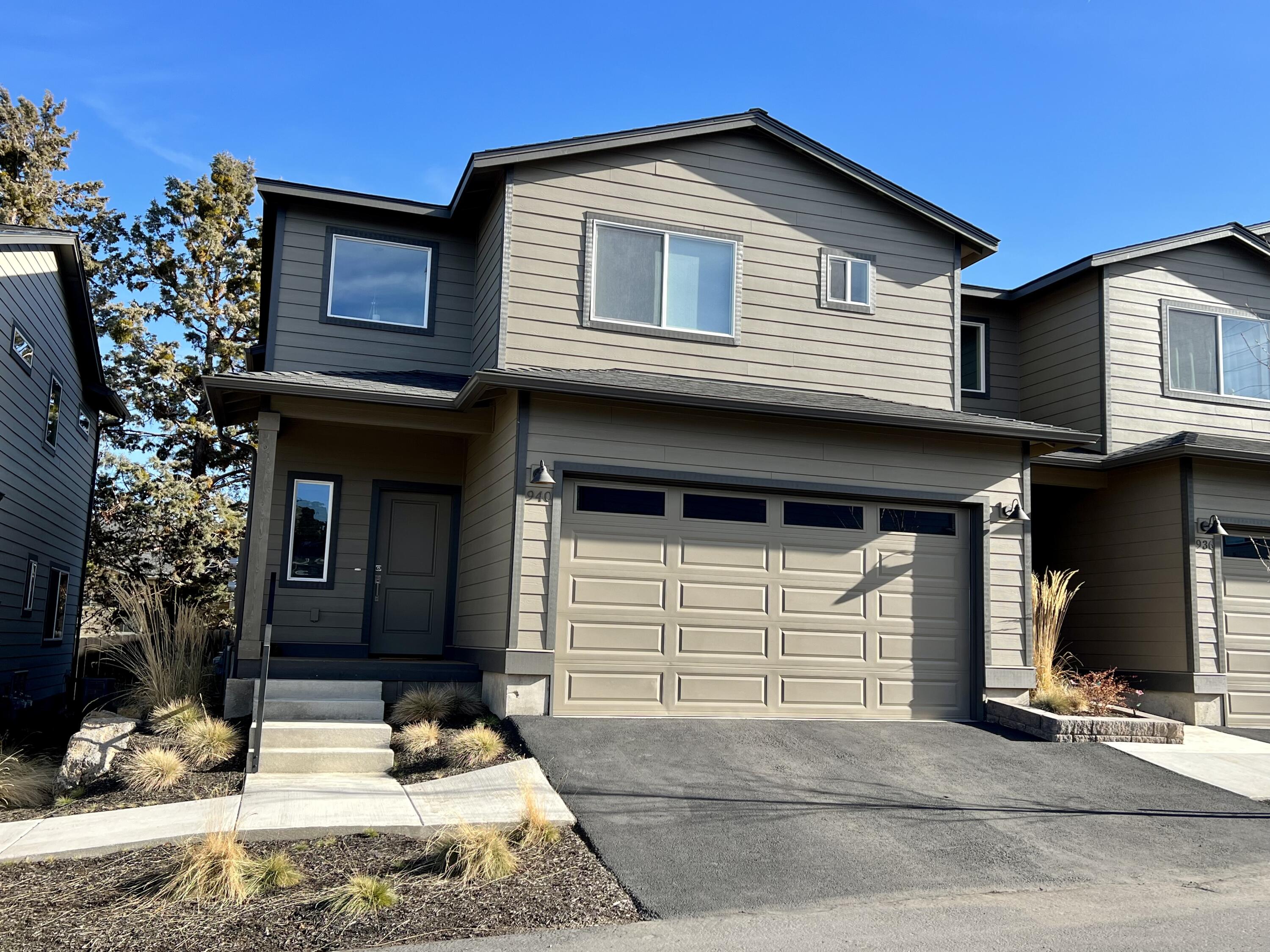 Two year young, immaculate end unit condo is a perfect income property, personal residence or vacation home. Close to Pilot Butte  trailhead and within walking distance to Costco, Safeway, restaurants, pubs and more... 
Upgrades include vinyl flooring throughout for easy cleaning, custom roller blinds and air conditioning. Black quartz counter tops in kitchen and baths adds a classy look. 
Whirlpool stainless steel appliances in kitchen and W/D are included.  All three beds, bonus area and laundry are located on the 2nd floor. 
This end unit offers extra windows for added light, a private deck with a storage room and a two car garage. What more can you ask for!  Ready to show anytime!