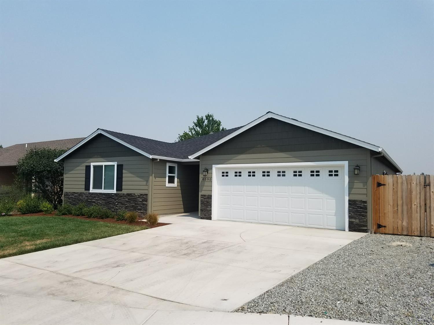 Wonderful newer construction just on the outskirts of White City. This 2017 built home features granite counter tops throughout, stainless appliances, laminate wood flooring, and walnut stained cabinets. This home was the last home built on Kyra lane and the builder added way more upgrades!. Property is completely fenced and landscaped with sprinkler systems. All you need is your BBQ and chairs to enjoy the private covered back patio.