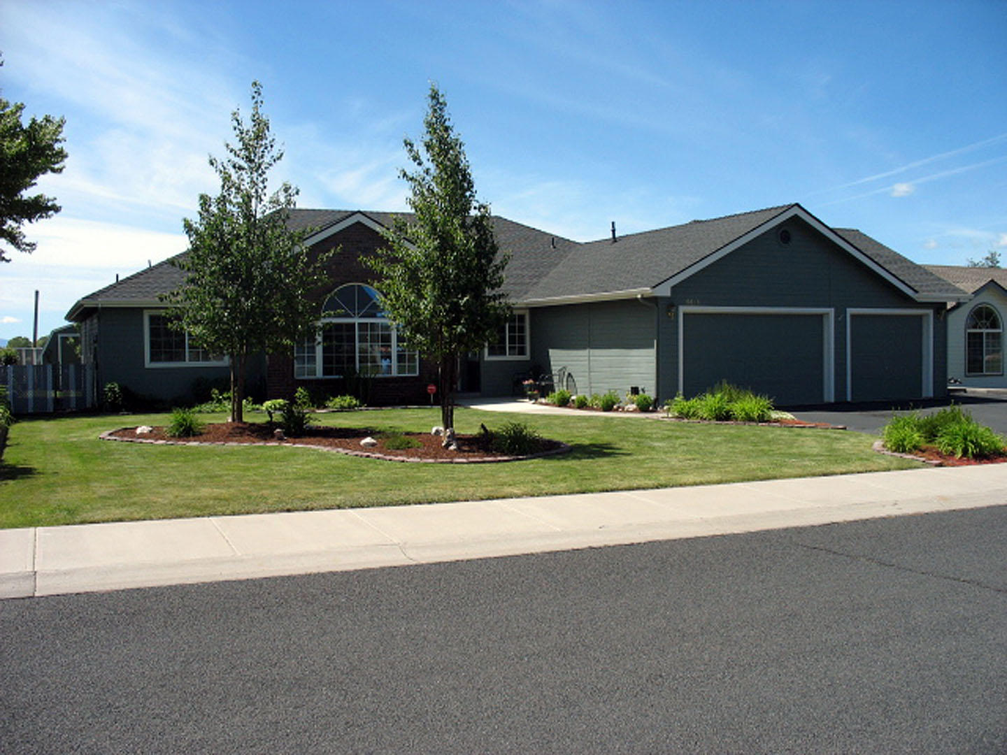 This beautiful home is move in ready. Features 3 bed/2bath, vaulted ceilings, family and living rooms and a formal dining room, granite counter tops in the kitchen. Immaculate landscaping in front and back. Backyard has a ''Man Cave'' and also additional storage shed for garden tools etc. There is also a covered concrete patio area to sit and enjoy your morning coffee.
An attached 3 car garage with RV parking area to the side. Back yard backs up to a vacant field.