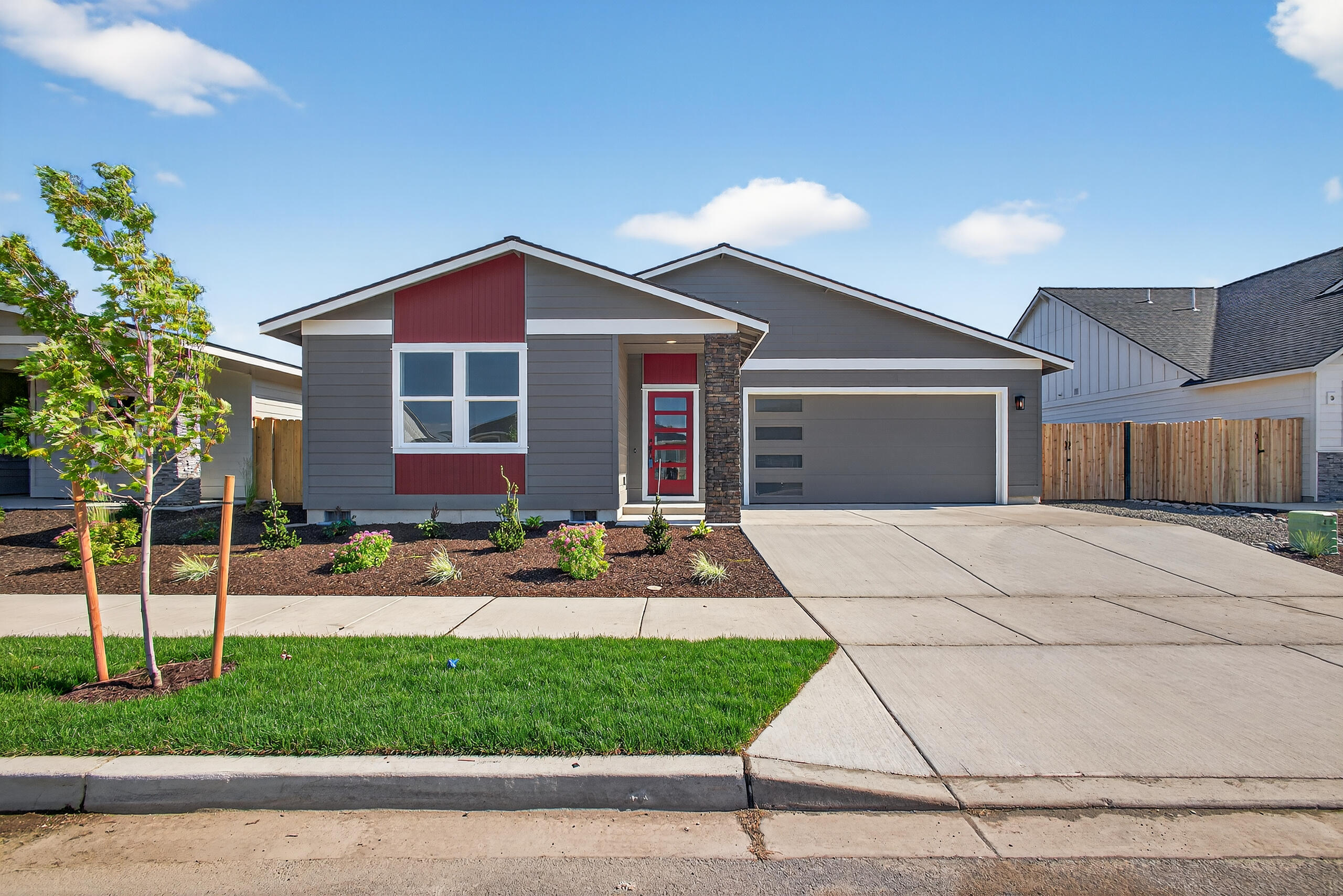 Last home available in Korbin Meadows! Just completed & move-in ready. Lot 30 features the Cascade w/ open floorplan & spacious 3 car (tandem) garage & covered back patio. Fenced backyard w/ landscaping & sprinklers, A/C, tankless water heater & upgraded finishes included! Primary bdrm features large walk-in closet, bathroom w/ 2 vanities, quartz counters, full tile backsplash, tile shower walls & enclosed toilet. Great separation between primary & 2 guest bdrms w/ full bath. Entertain in your kitchen w/ SS appliances, hidden walk-in pantry, full height tiled backsplash, extensive slab quartz countertops, soft-close cabinets & large island opening to vaulted dining area & great room w/ decorative gas burning fireplace. Durable laminate plank flooring thru-out w/ carpeted bdrms. Laundry/utility room too.