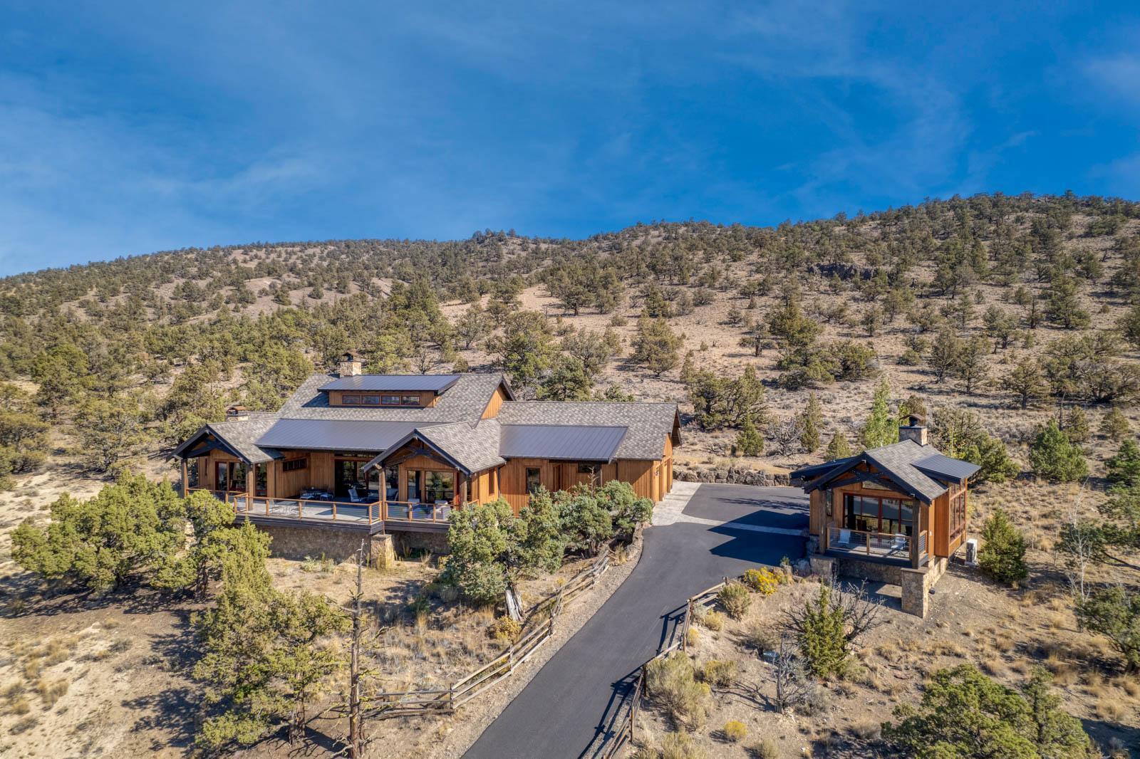 Views! Views! Views! Spectacular panoramic Cascade Mountain views from this beautiful Brasada Ranch custom home perched high up on coveted Hat Rock Loop. The one level main house has 3 bedrooms and 3 ½ baths, office and 3-car garage. Great room concept features rock fireplace with soaring ceiling. The 424sf freestanding Casita included in main house square footage. Make it your office, guest quarters or art studio, with exceptional mountain views. Partially covered west facing outdoor deck space captures the majestic views, perfect for entertaining.  Private back patio is complete with natural gas fire pit and built in BBQ.  Enjoy all of the luxury amenities, including Golf, athletic center with pools, gym, exercise studio, tennis/pickleball courts, kids activity center, equestrian center, restaurants, spa, general store and miles of bike & walking trails. Casita is approved for short term rental within Brasada Ranch. Buyer to do due diligence. Please allow 24 hours notice for showing