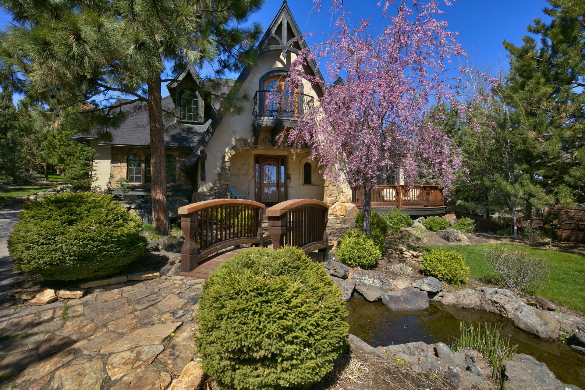 Sophisticated yet inviting, this timeless home blends European style with a comfortable floor plan & modern amenities. The grand entrance leads to the vaulted great room, with a floor to ceiling wood burning fireplace, reclaimed wood floors & timber beams. The beautifully remodeled kitchen is a focal place in the home. Adjacent to the kitchen is a light filled breakfast nook which opens onto a sunny east facing patio; the main dining area has French doors opening to the covered rear patio. Cozy & serene, this patio features a stone fireplace & has access to the main level master suite. The second bedroom/office is also on the main. An open loft upstairs leads to two bedroom suites. The luxurious apartment over the 3-car garage offers great separation for guests or teenagers. As a 2008 COBA Tour of Homes winner including Best of Show, this home is a must see. Located in Awbrey Park, a neighborhood of newer homes on the Awbrey Butte. Close to the park, trails, golf, biking, & Downtown.