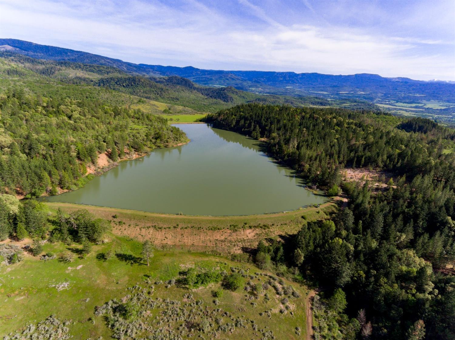 PRICED Reduced Seller Motivated!! Star Ranch is a one of a kind, Very Private with its own lake, at end of a county road. Ranch has 680 acres. Only 15 Min from Eagle Point.This beautiful Mt. Hideaway has its own Lake on a separate 160 acre tax lot.Ranch as 5 dwellings Main home is 5213 Sq ft. w/solor in Ground Pool.2nd home is Managers home 2038 sq ft.plus 3 other homes Irrigated Pasture has free gravity feed water with 10,000 ft of 8 pipe from lake that runs Wheel line. Field grows nice crop of hay.Thousands of acres of BLM surround this ranch.Lots of ELK, Deer, Turkeys are just some of the wildlife that live here. Private Lake has Bass, Crappy, Blue gill.