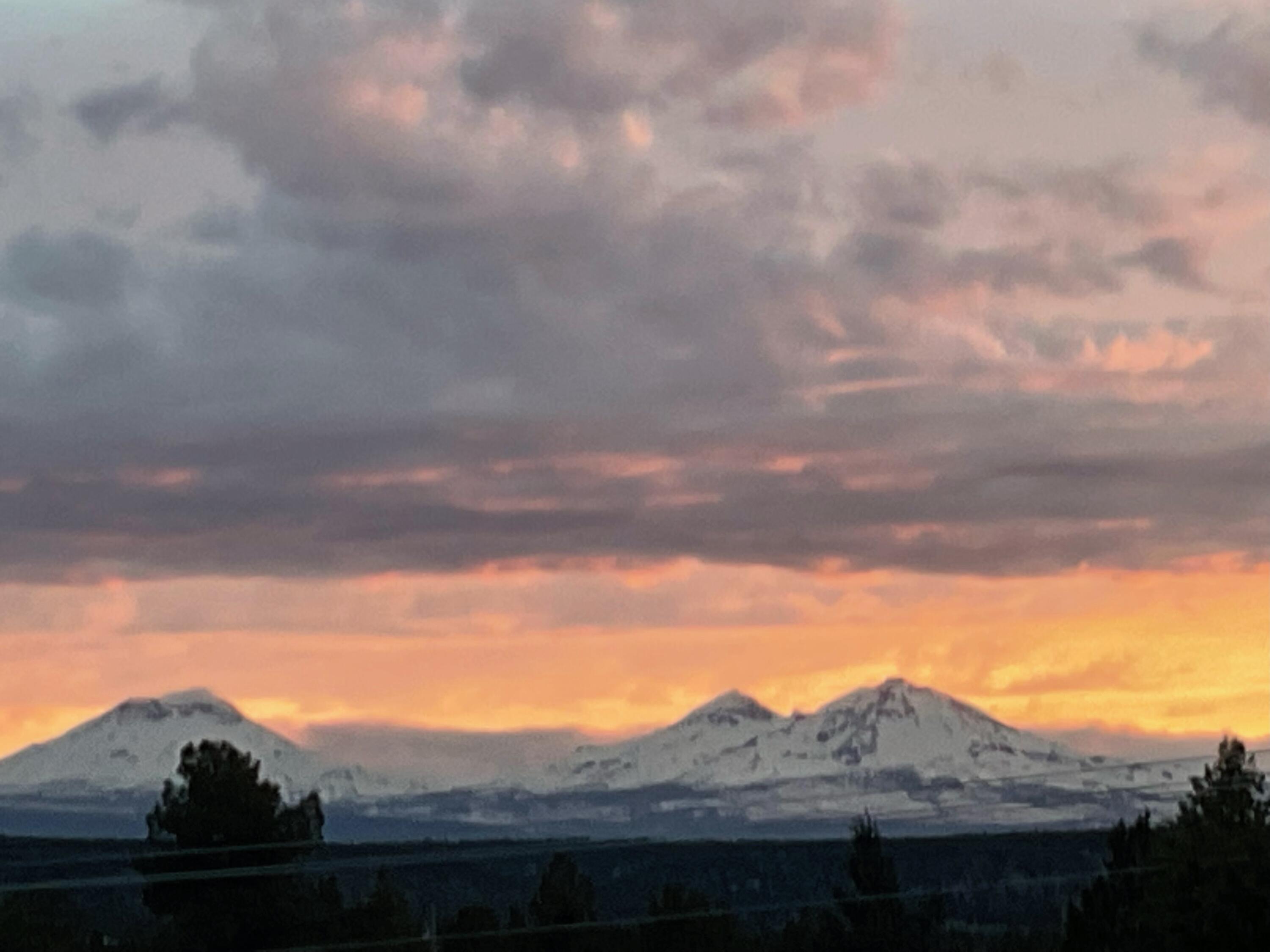 Standing on the deck of this Northwest style home you see Mt. Hood to Mt. Bachelor along with truly unbelievable sunsets. Lots of windows allowing a light & bright interior. 3bed/3bath, plus office. Great room with vaulted ceilings and a tall rock fireplace. Spacious kitchen w/granite countertops. Dining area. Hickory cabinets & built-ins throughout. There is a mini suite on the top floor w/full bath. Main floor has a guest bedroom, office & full bath. Bonus room & updated master suite w/enclosed screen porch is located downstairs. The interior and exterior were recently painted. New roof in 2021. Newly stained deck. New furnace 2022. Ductwork recently cleaned. This 4.5 acre property offers 2+ acre fenced pasture with loafing shed & hose bibs for horses. Terraced landscaping. $30k in boulders. Shop w/large doors, art studio, open bays for parking equipment & toys. RV storage w/parking & full hook-ups. Buyer can talk with county about the possibility of an ADU. New asphalt driveway.