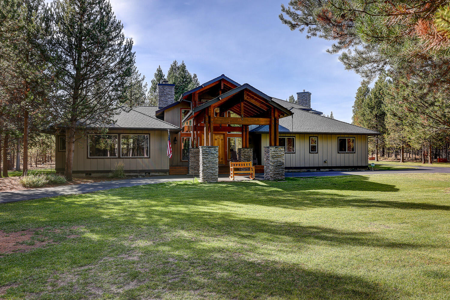 Spectacular Custom Home on 10 Acres with End-of-the-Road Privacy! The security-gated entry opens to a park like setting w/large water feature, circular paved driveway and covered Craftsman entry! 2006 Perry Walters built home features: 3700+sf, 3Bd/5Ba (each bedroom w/private bathroom, vaulted Great Room w/open beams & pine ceiling, gorgeous floor-to-ceiling stone Fireplace, wood-lam floor, open dining/kitchen w/tile floor, granite island/B-Bar, Knotty-Alder Cabs, SS appliances, dbl ovens & white-wine ref, Grand Master suite w/access to back deck, Electric FP, huge private bath w/his & her vanities & walk-in closets, upstairs office loft + big wood-stove & kitchenette + full bathroom, family/rec-room, large back deck w/hot tub & fire pit w/huge attached 1125sf 3+ car garage + detached custom frame built 30x24 shop w/two 12' covered wings wired 220v!  Newer upgrades include: HVAC/Central AC, private well, exterior paint, and carpets!