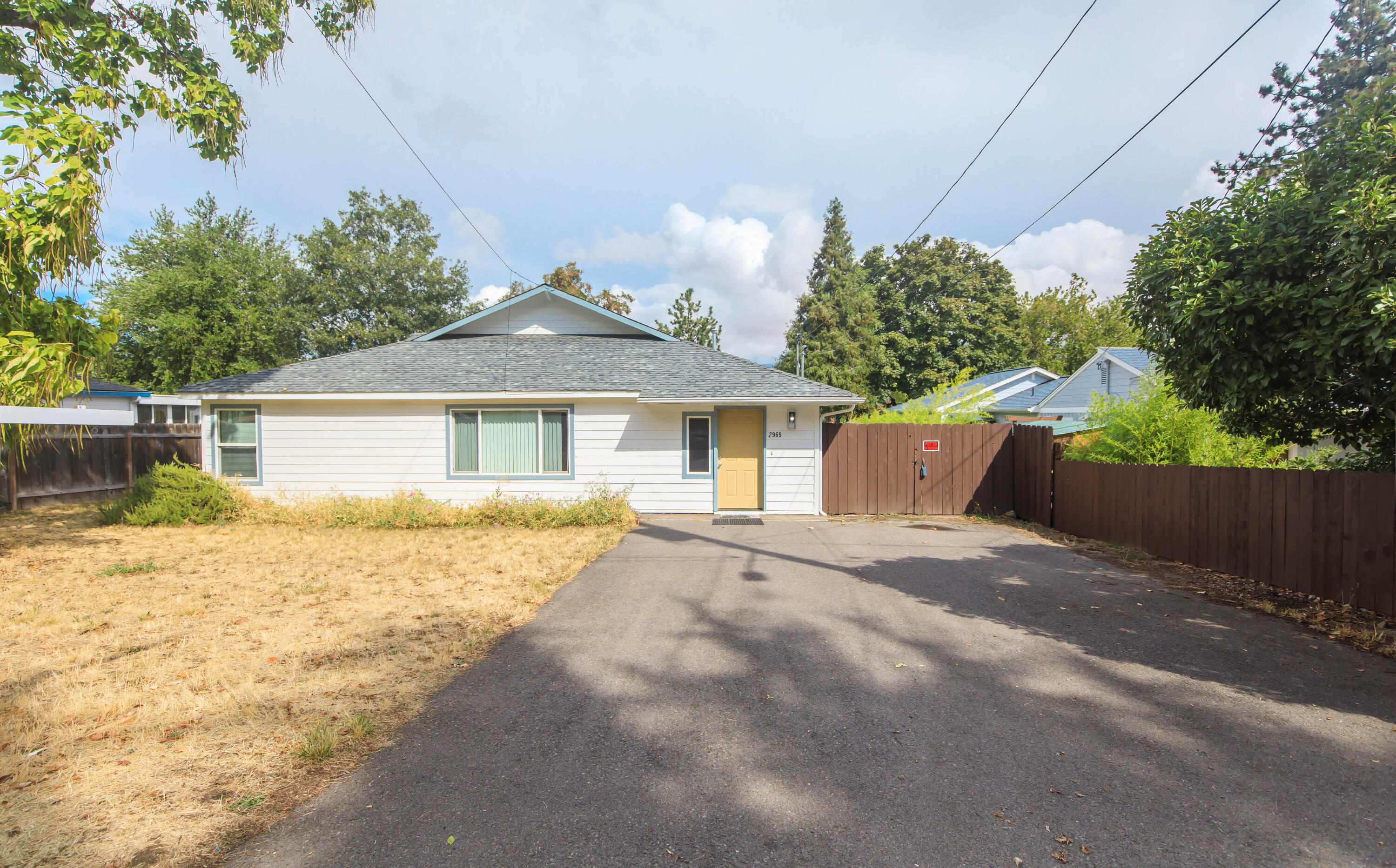Charming Ashland home in a fantastic neighborhood! The home boasts 2000 SQFT 4 bedroom, 2 bathroom home recently painted inside and out. This move-in-ready property features vaulted ceilings, brand-new heat pumps for year-round comfort and new carpet. Enjoy stunning mountain views from the large back deck. With two gas meters, two electrical panels, and two heat pumps there's excellent potential for duplex conversion—ideal for investors or multi-generational living.  Buyer to do their own Due Diligence regarding Duplex conversion.