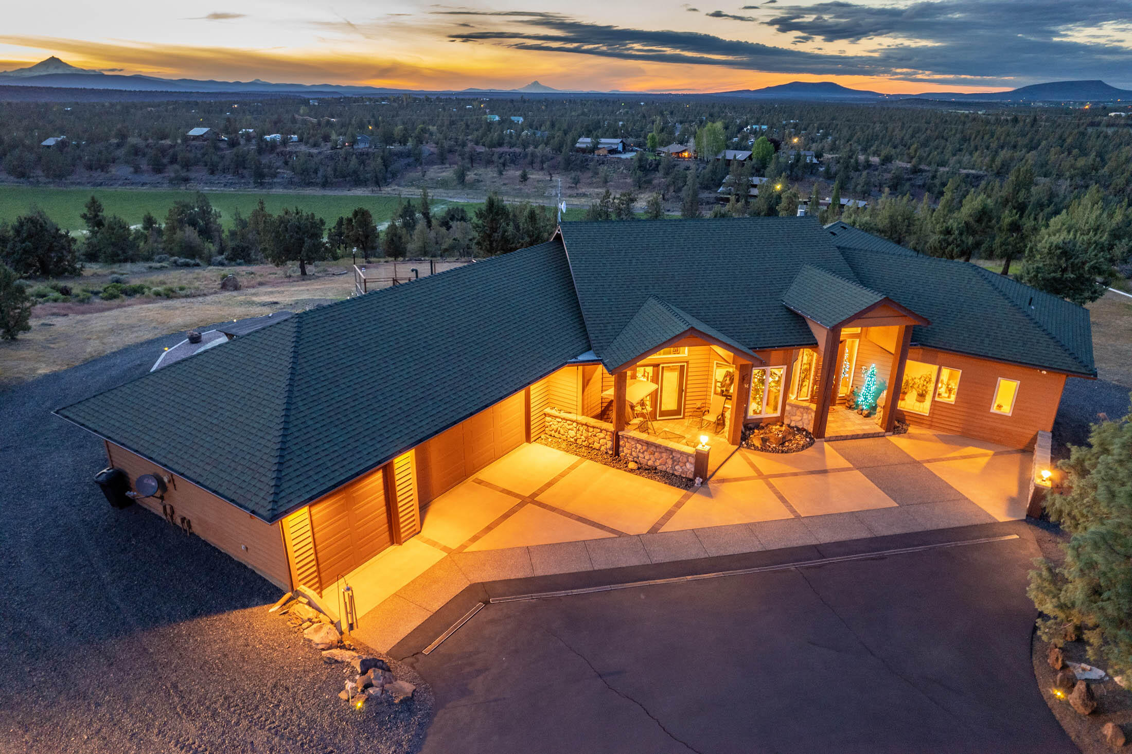 You'll be excited to invite your friends & family over to relax with their favorite beverage on your wonderful paver deck. They'll be wowed by the spectacular panoramic views from Mt. Washington all the way to Smith Rock, & as night falls, your guests will be in awe of the beautiful sunsets & lights from the valley below! With Redmond only 10 minutes away, you can pop into the Brickhouse or any of our other fine restaurants, or Starbucks for your favorite coffee & croissant, or Ida's Cupcakes if you prefer something sweeter. There are so many great shops in Redmond, but if you can't find what you're looking for, Bend is just a short 27+/- minutes away. Redmond & Bend are known for their outdoor activities & great events! To top it all off, the home has so much to offer, including a wonderful floorplan, radiant heated floors, his & her private vanities, a nice walk-in closet, BLM on 2 sides, a shop, office, a mud room, & so much more! Come look, you won't be disappointed!