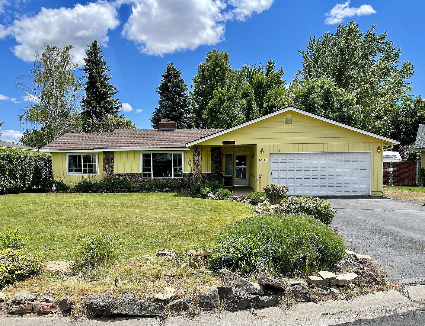 Peaceful by day, tranquil by night, this well-maintained Gatewood home sits in a private cul de sac. Offering 2023 sq.ft. of living space, this spacious home provides 3 large sized bedrooms and 2 full bathrooms with accessibility features. Front entrance has an accessible approach with ramp which can be removed. Beautiful stone slate entrance welcomes you into a large living room providing a feeling of coziness with a built-in wood burning fireplace. Separate dining area, kitchen with pantry and breakfast bar, family room with a built-in gas fireplace, linen closet, laundry room, very large master bedroom with walk in closet, and much more. Property is fully landscaped and fenced with a sprinkler system in the front and back, square raised garden beds on a drip system irrigation with matured pear and plum trees. Enjoy your morning coffee on your covered backyard deck or evening fun in your jetted tub. New A/C and heat ducting. Roof replaced in 2009. A Must See!!!