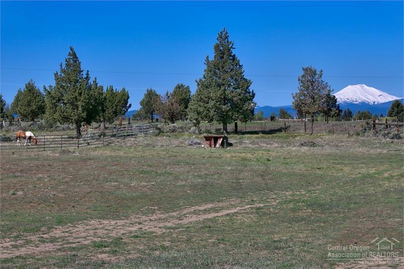 Build your dream home on this quiet & serene pastoral property surrounded by nature. This beautiful location boasts incredible cascade mountain and Pilot Butte views in an area of nice homes. 3 acres of COI irrigation rights and a 1440SF barn to get you started.