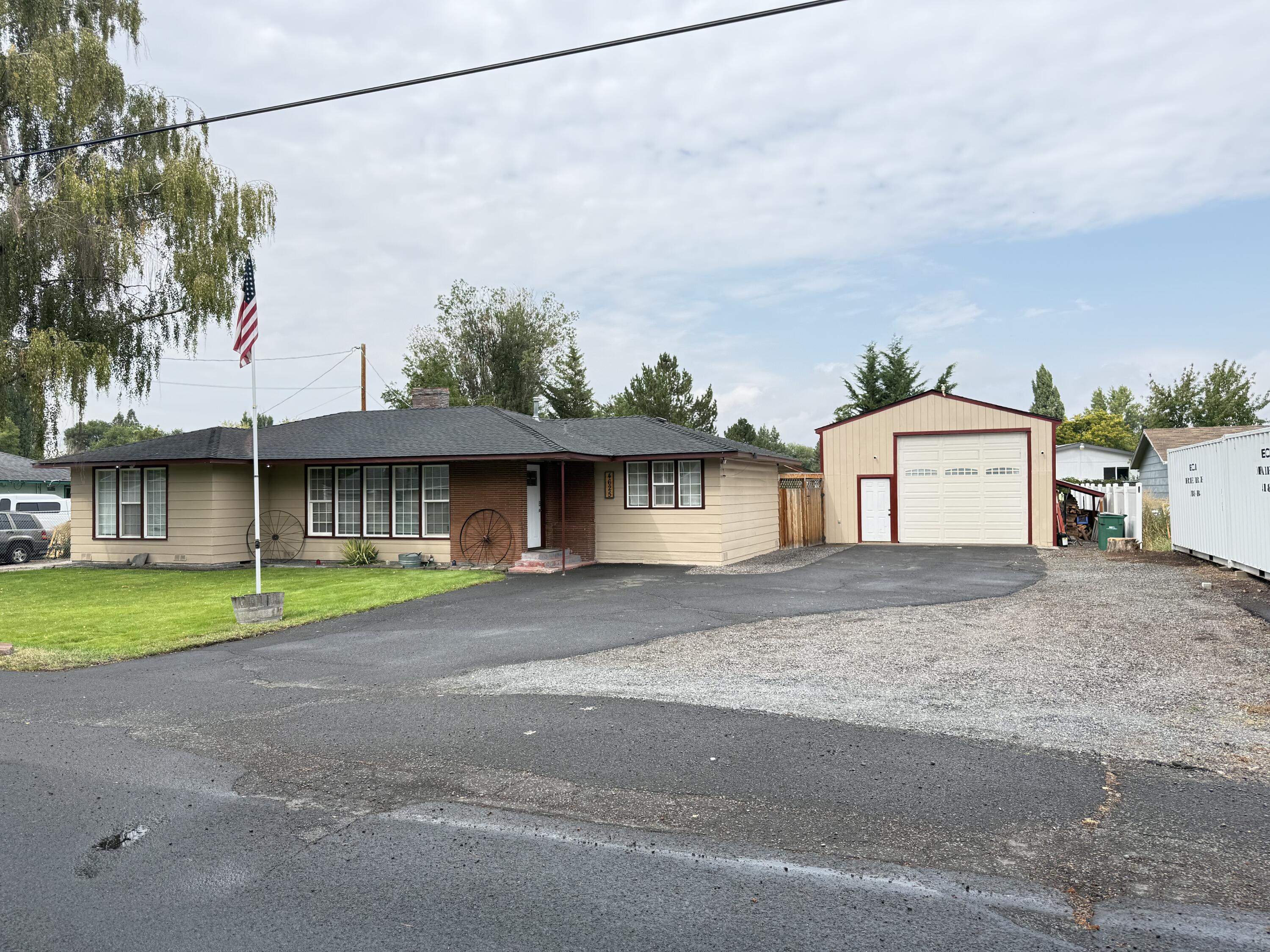 Incredible opportunity with the single story three bedroom two bath recently updated home! This property features a 24 x 24 shop with tall ceilings, a massive fully covered back patio, large flat and fully fenced backyard and has tons of space for entertaining. The kitchen is open to the living room and the kitchen and both bathrooms have recently been updated. It's pretty rare to find a home like this with the shop at this price.. Come, check it out for yourself and view the smooth flowing floor plan of this turn key property!