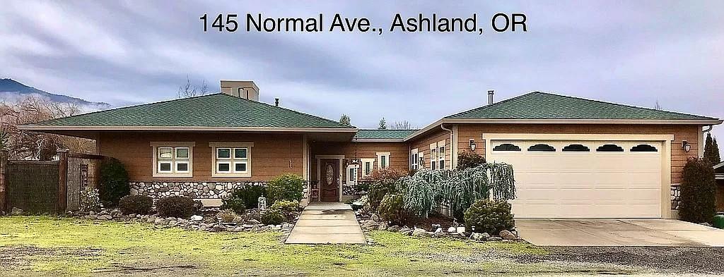 Single level, fenced, irrigated one-acre home has 3 bedrooms/2.5 baths plus large den on cul-de-sac w/360-degree mountain/valley views. Features high ceilings/fans, skylights, French doors, walls of windows, Solar Electric, radiant heat floors, & wood stove. The Great Room has granite island w/wet bar, pantry, & 20' vaulted ceiling. Tiled floors throughout, carpeted bedrooms. Master has armoires, built-in shelves, double closet, private bath w/jacuzzi tub/shower. Wraparound deck w/retractable awnings, screen-in gazebo w/ceiling fan. Landscaped acre boasts pond w/waterfall, gas firepit, covered patio dining, 8 garden beds & 5 fruit trees. Attached insulated 2-car garage w/workbench, shelving & closet. Detached storage shed includes riding lawn mower. Lots of off- street & RV/boat parking. Located 5 min. from downtown Ashland Plaza, grocery stores, bike/hiking trails. Nearby attractions of skiing, rafting, fishing/boating, art/science museums, & SOUniv.