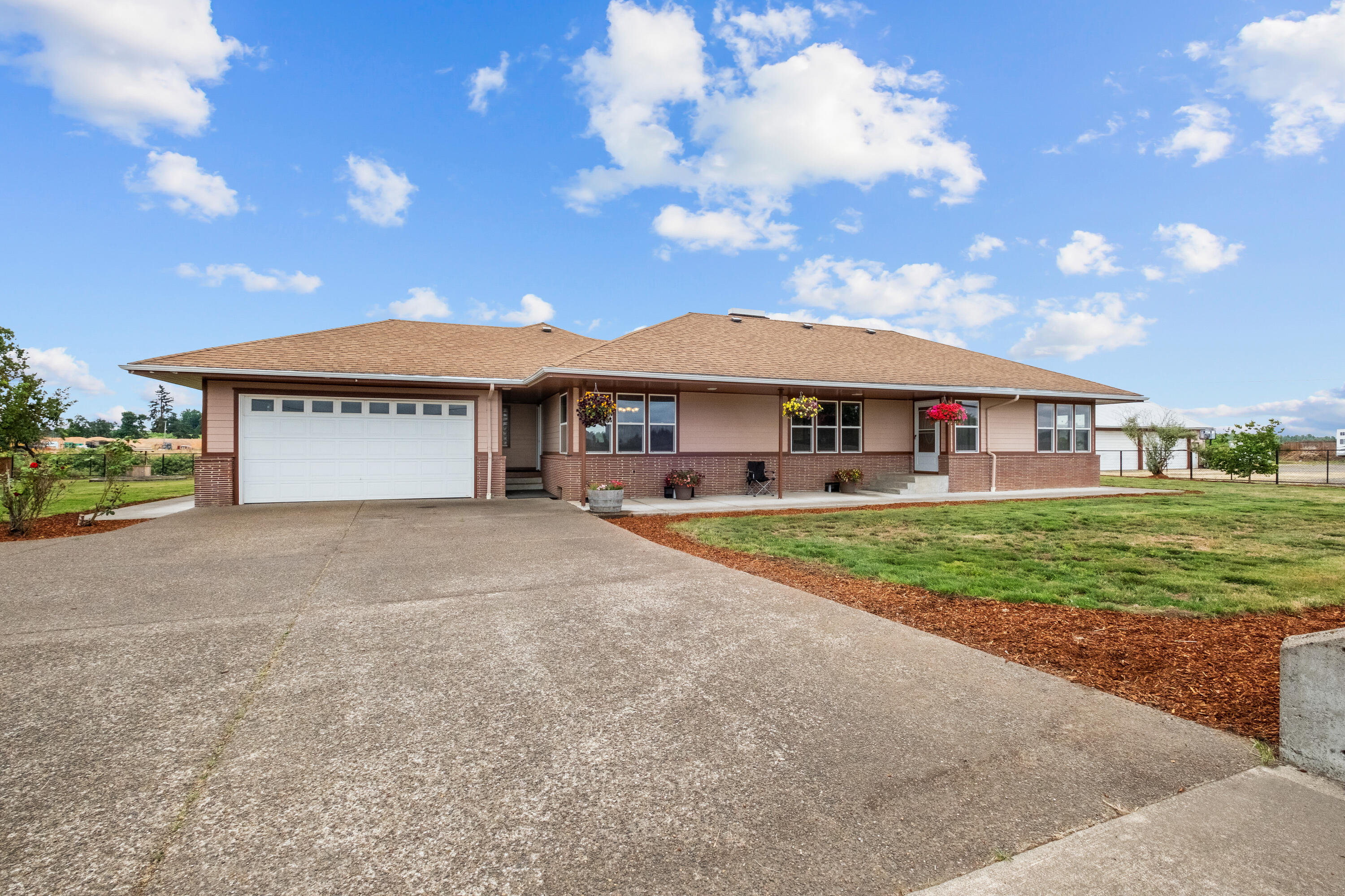 Located in the countryside on 2.1 +/- acres, 3 miles west of Stayton & close to Salem OR, this lovely home has a 3,340 sqft home, 440 sqft attached garage. The home features 3 bedrooms & 2 bathrooms, with the primary floor boasting a walk-in closet and soaking tub. There is ample storage & room for entertaining, as bonus rooms include a fully finished basement & a den. This property offers plenty of privacy with a frontal concrete wall w/ 2 gated entries. Landscaped backyard includes a concrete patio!
