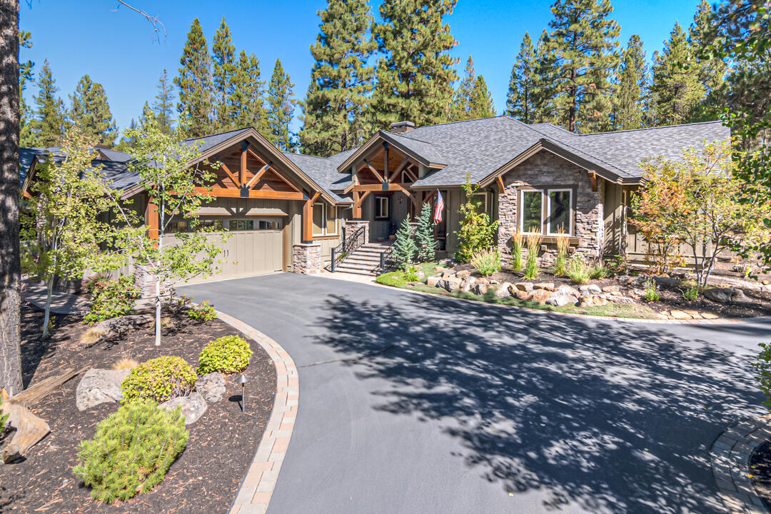 Perfectly-sized, single-level 4 bedroom Caldera Springs home backing to large common.  Extraordinary attention to detail was put into this home. There is a beautiful Great Room with exposed beams and trusses, hardwood floors, gourmet kitchen w/pantry, unique ''leathered'' granite in baths,  and a beautiful paver patio with firepit and a Bocchi Ball court. One of the Guest Suites has custom built-in bunks with full (doubles) mattresses on the lower level and twins on the upper. Perfect for the kids or grands. Another Suite completes that wing of the home. On the south end of the home, there is a full bath, guest bedroom currently being used as a large office and the Primary Suite with a gas fireplace and a spa-like bath. Even the garage has been updated with epoxy floor and ample storage above. This home was a custom build for the current owners and has never been rented. The fit and finish throughout is unparalleled.