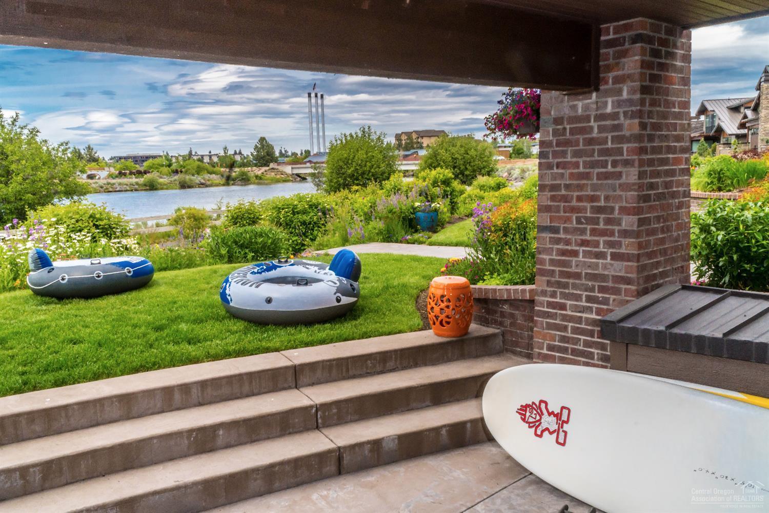 Rare Deschutes riverfront luxurious residence combining the best of both worlds. Thoughtfully constructed w/the finest materials emphasizing Cascade mountain, riverfront, Old Mill views & river access. Two master retreats w/one on the main level. Additional guest suite, gourmet kitchen w/granite surfaces, stainless, commercial grade appliances & plenty of prep space. The Acacia floors, extensive Alder cabinetry, use of brick & sledge-stone will impress. Bonus room, wet bar, office, flex room, great garage.