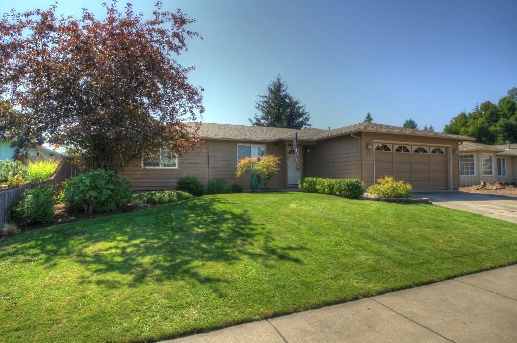 Check out this wonderful single level home in the Southwest Medford area, close to South Medford High. This turn-key home has been well taken care of over the years. It features an open floor plan with 3 bedrooms and 2 full baths with a conveniently laid out kitchen with newer appliances, a dining area with a slider to the covered patio, and large living room with a bay window. In addition to the covered patio, there is a nice backyard with a large deck off the master and a hot tub pad with power, and of course a 2-car attached garage. Nice laminate flooring throughout the living area and new carpeting in the bedrooms make this the perfect home for a first-time buyer or investor.