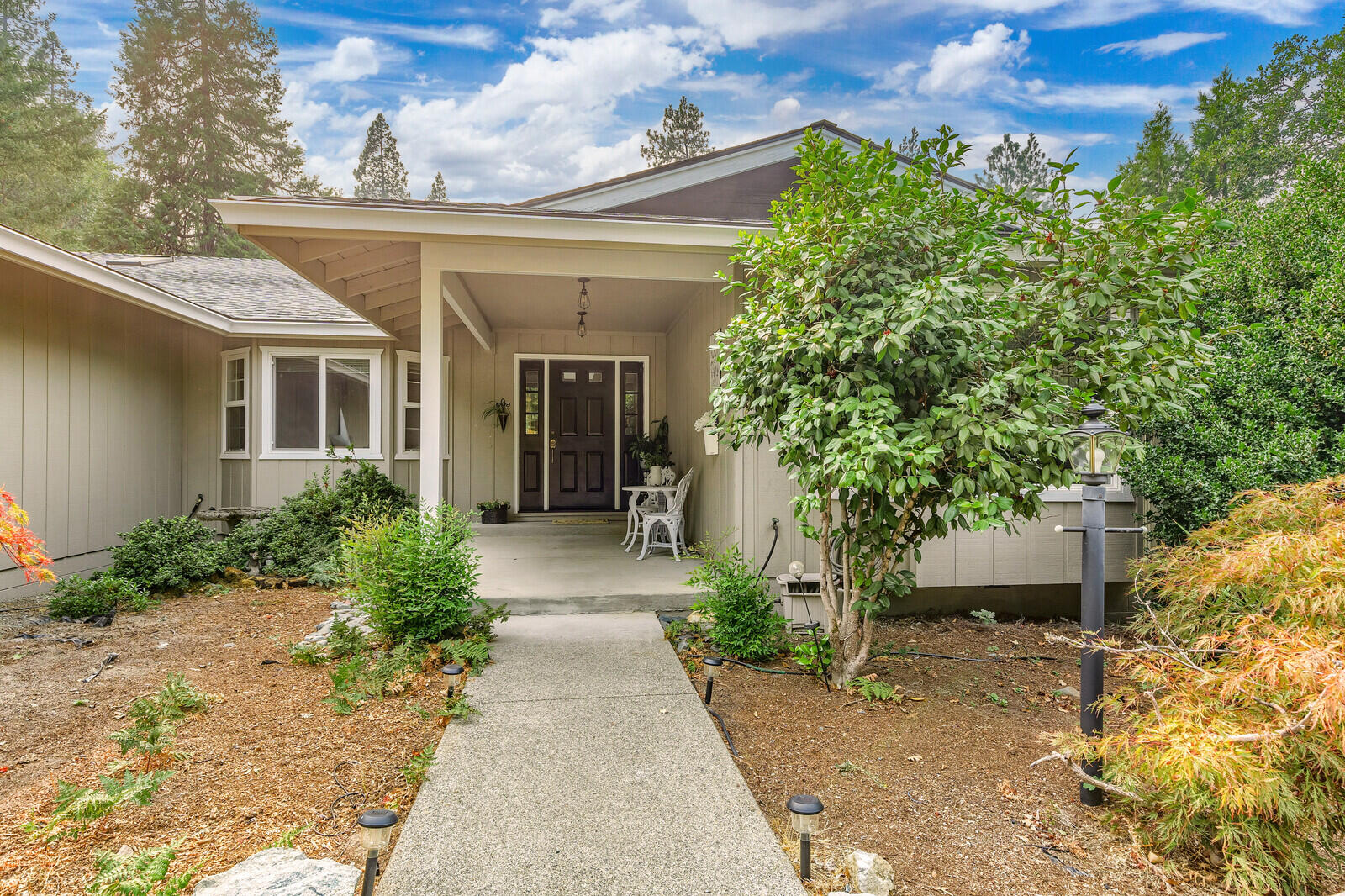 ** Potential for a 2 Family Set Up with purchase of adjoining lot ** Located in the beautiful Colonial Valley close to 1-5 and the towns of Merlin and Grants Pass. This spacious single level home has a very nice floor plan with large windows and skylights to let in the natural light and the outdoors. Many upgrades have been done over the last 3 years including new roof, huge new deck which is great for entertaining, new paint, new garage doors, and new flooring in a lot of the home. The 4 car garage has TONS of cabinets for storage. Garden area, Chicken Coop, fruit trees include a Granny Smith apple, Walnut and Nectarine as well as Raspberries.  2 heat Pumps, Storage at back of property for your tractor and tools. Plenty of room for your RV and other toys. Well Flow test done in 2018 came in at 11.7 GPM. Any buyer considering this property to perform their own due diligence into all aspects of the property including intended use and condition.