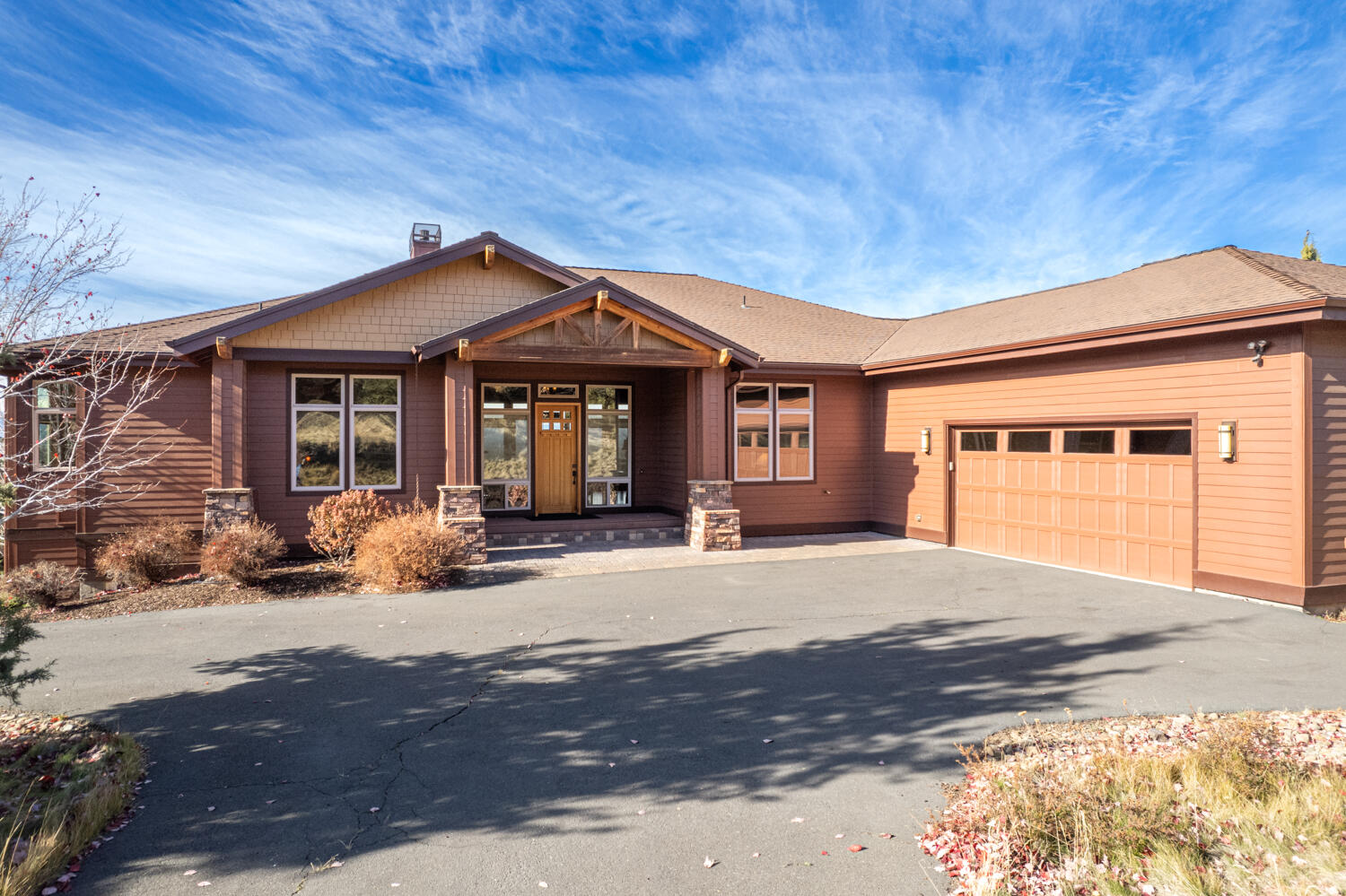 This Spectacular 3 bedroom 3 bath Custom Home in the West Ridge at Eagle Crest Resort is perfectly situated on a hillside to capture the Sweeping CASCADE MOUNTAIN VIEWS.  Offered Furnished Turnkey.  Light filled Open Concept Great Room with Teak Wood floors, soaring 11ft. ceilings, walls of windows, gas fireplace with massive stone surround.  Chef worthy kitchen with gorgeous Slab Granite countertops, professional grade appliance including a 5 burner Dacor cooktop.  Huge kitchen island, pantry, custom knotty alder cabinets, central vac. Two Master en-suites one with jetted tub, a stunning shower space and access to the expansive covered trex deck to enjoy the fabulous Mountain Views.  Additional bedroom for guests.  Two dining areas.  Large office/den.  Oversized 812 sq. ft. garage, security system, surround sound, window sun screens throughout.  The unfinished daylight basement is an additional 1297 sq. ft.