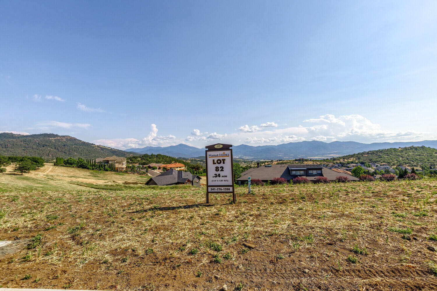 Saddle Ridge Phase 4, Lot # 82.  South facing homesite with VIEWS of the valley.  Located in a neighborhood of upscale homes in East Medford.  This is not a build package.  Purchase the lot and bring your own builder.  All building plans must be submitted to the architectural review committee prior to the start of construction.  The listing agent is related to the seller.