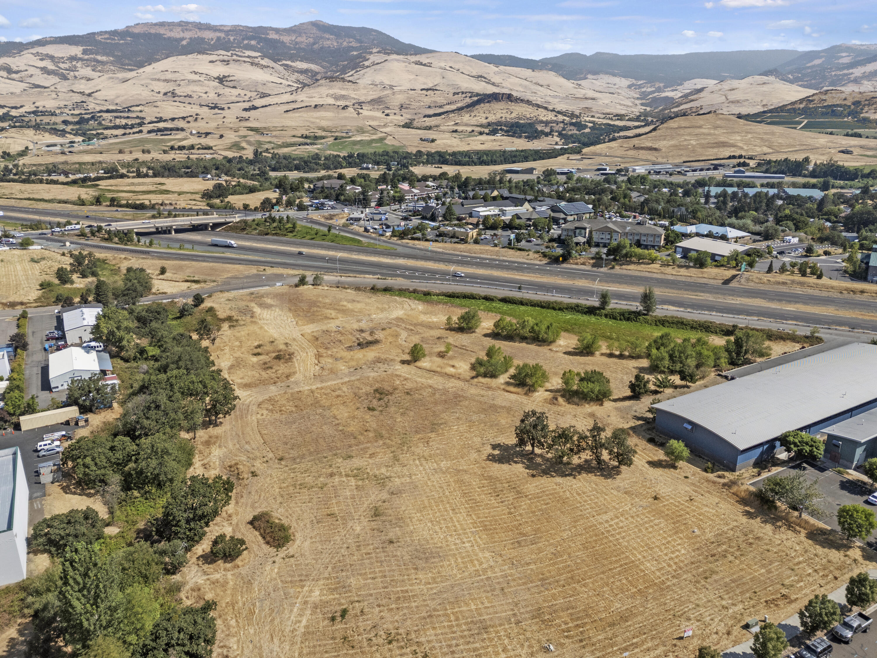 Shovel ready building site with 6.01 acres with approval for over 67,000 square feet of commercial space by the City of Ashland. All street improvements for the first phase of this project have been completed. Available for land acquisition, build to suit or lease. Listing broker, partial owner.