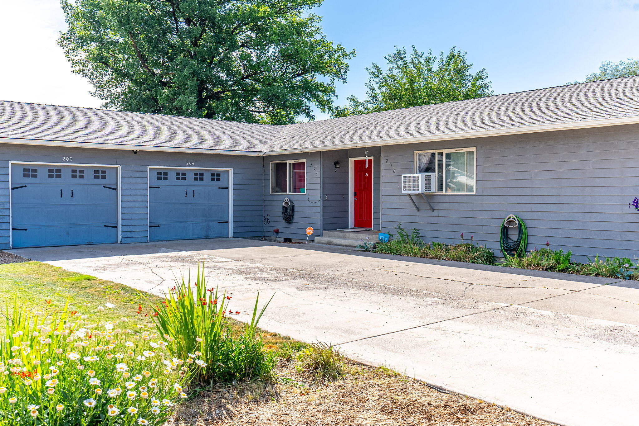 Live in One, Rent the Other!
By November 1st, 2025, this well-maintained duplex will have a new tenant in Unit 204, while Unit 200 will be available for owner occupancy—the perfect setup for a live-in owner or investor. Each unit offers 2 bedrooms, 1 bathroom, a private fenced yard, and its own garage space, providing both comfort and privacy. Unit 204 has been updated with LVP and tile flooring, new baseboards, backsplashes, freshly painted cabinetry, a modern bathroom vanity, and a beautifully tiled shower surround. The other unit retains its original character, giving you the opportunity to add your personal touch or update to your style. Located on a corner lot just off Main Street, you'll enjoy easy access to shopping, restaurants, and local parks. Ask about an owner-occupied 100% loan program available for duplex properties—buyers can use the rental income from the other unit to help qualify!