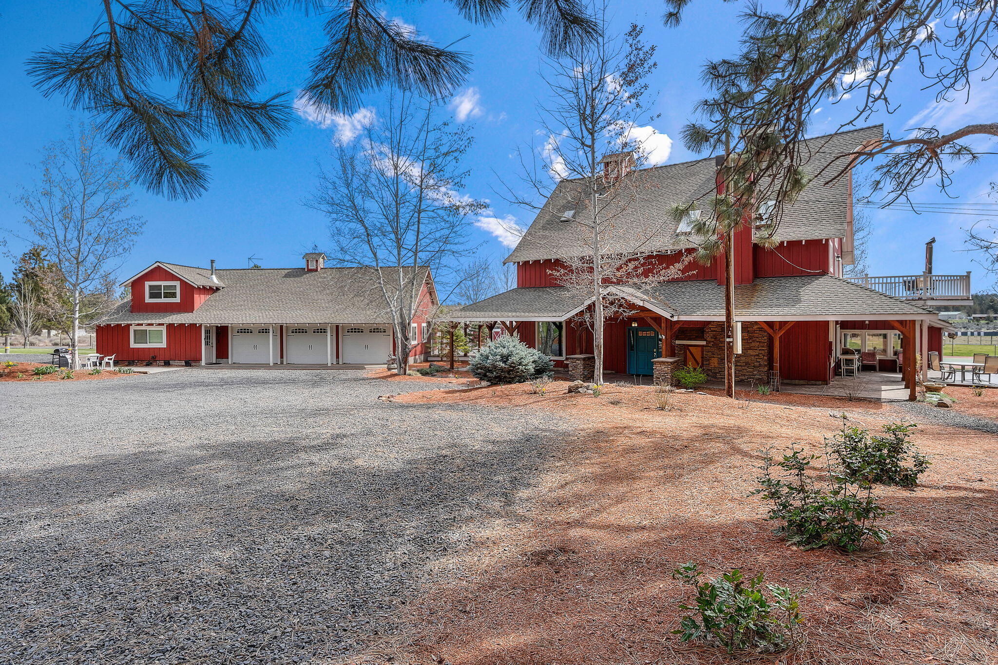 Nestled in Central Oregon, is the Red Barn Farm in Sisters,Oregon, offering a blend of rustic charm & modern amenities. This 4,279 sq ft primary residence, is complemented by a 1,000 sq ft mother in- law suite, for a thoughtful design and functionality. Main house boast 4 spacious bedrooms (3 are Ensuite) and 4.5 baths, providing ample space for family and guests on 5.77 irrigated acres. Main floor houses 1 master and an office. The ADU, has a full kitchen, lg living room, 2 bedrooms, 2 baths, and climate control mini-splits. It offers versatility as a guest suite, rental opportunity, or private retreat. The property's exterior is equally impressive, featuring a 3-stall barn,tack room, & storage for hay & equipment. Automatic underground sprinkler & irrigation systems, a reliable well and a septic system. It has pet-friendly floors, a fully fenced yard, and an outdoor kennel. Currently operating as a successful short-term rental on Airbnb it provides a steady income for the owner
