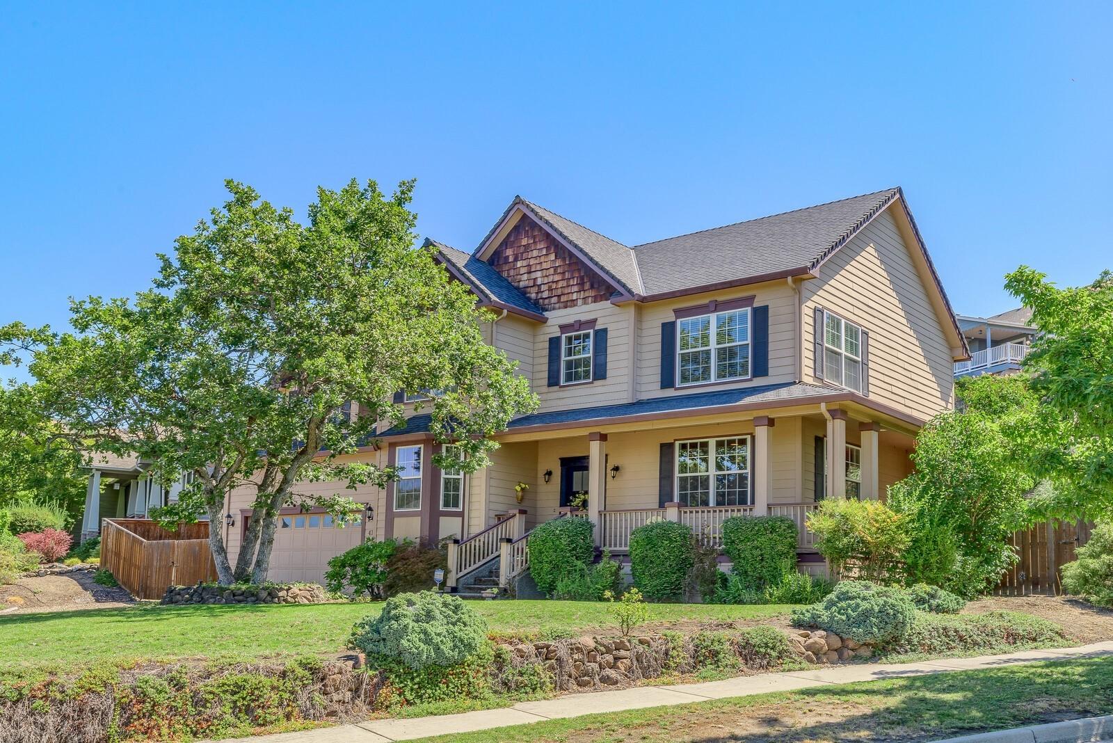 Gorgeous home on large corner lot across from Hillcrest Orchards.  Enjoy the views of the vineyard and Roxy Ann from the fantastic wrap around porch.  Tucked away in this East Medford neighborhood, the home resides in the Hoover, Hedrick, North Medford School District.  This house has a lot of character with quality tile and woodwork throughout.  Large Media/Family room wired for surround sound and with plenty of storage.  A fifth bedroom was converted to an office to give the half bath more room; however, that could be converted back.  Plenty of storage in the House.  One of the amenities sought after in the Valley is RV Parking.  This house has a great spot for an RV, boat, toys, whatever!