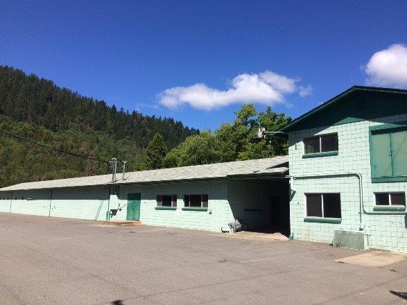 15,000 s/f building offers many manufacturing light industrial option and uses. 800 amp, 3 phase power plus separate 250 amp, single phase. Designed as 3 separate areas, all currently connected under one roof. Paved parking, irrigated pasture, well, state of the art septic and separate hook-up for caretaker quarters. Non-conforming use in UR-1 zone, but established since the early 1960's. Owner will consider leasing.