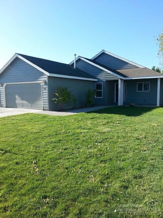 You are going to love this 3 bedroom, 2 bath home with 1352 sq ft of living! A double car garage with room for the RV on a large, fenced lot. Remodel is completed with laminate floors in the great room and kitchen. Carpet and vinyl in the remainder of the home. New paint inside and out. Vaulted great room, Master with walk in, closed and large shower, and a separate utility room. All new stainless appliances, including refrigerator. This home is vacant and ready to go. Forced air gas heat tops it off.