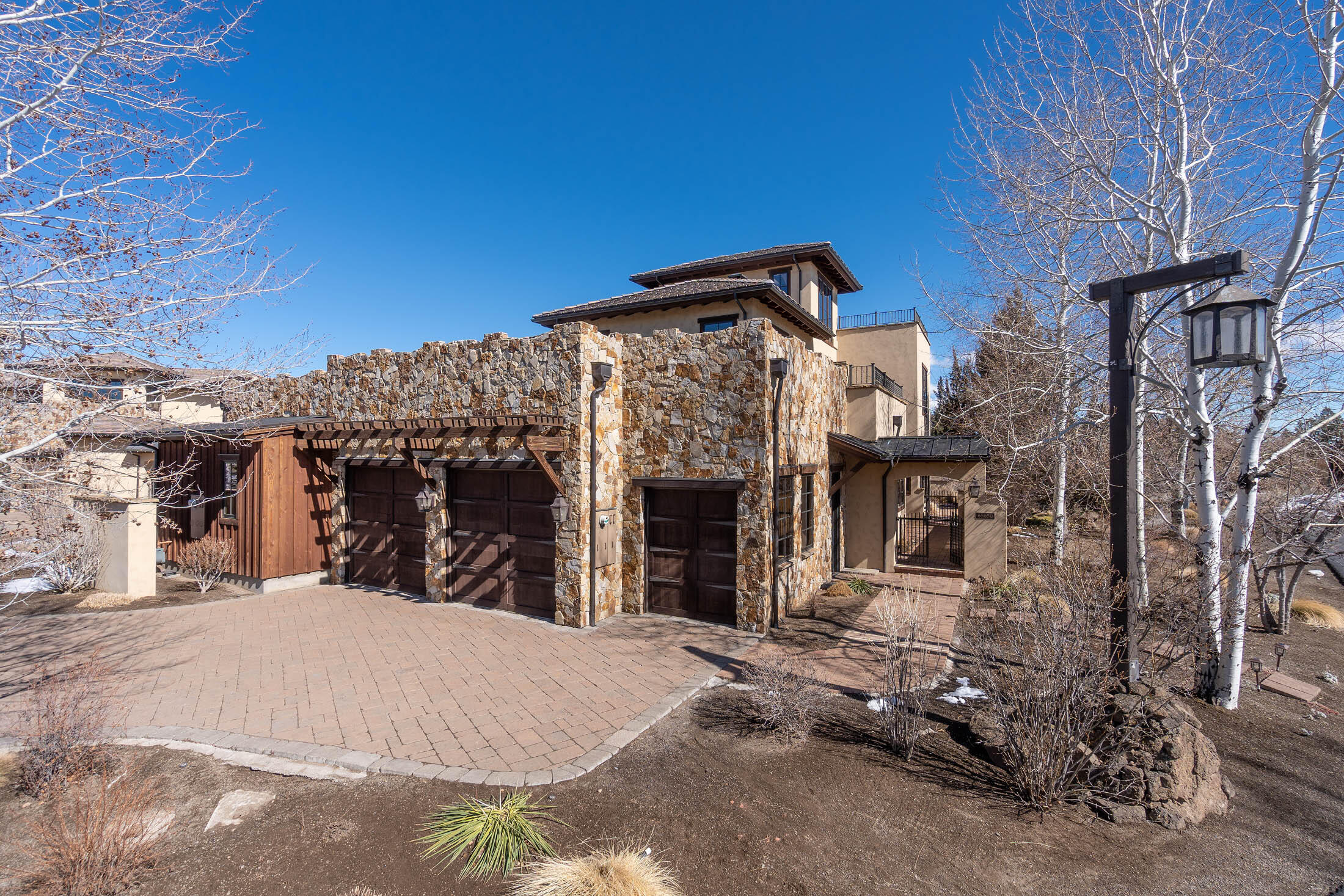 Welcome to the Villas at Pronghorn! This beautiful 3 story Tuscany-inspired luxury home features an open great room, high ceilings, hickory flooring, gourmet kitchen w/ high end appliances, Sub-Zero fridge plus wet bar & wine fridge, spacious dining area.  4 Bedrooms w/ en-suite baths (2 on main/2 on 2nd floor), 2nd floor patio with gas fireplace & fabulous views. Take the spiral staircase to the third story bonus/office area w/ beautiful built-ins, wet bar, private roof top patio and fire pit. This hidden gem provides endless indoor/outdoor entertaining opportunities! Experience world-class resort living in the heart of Central Oregon!