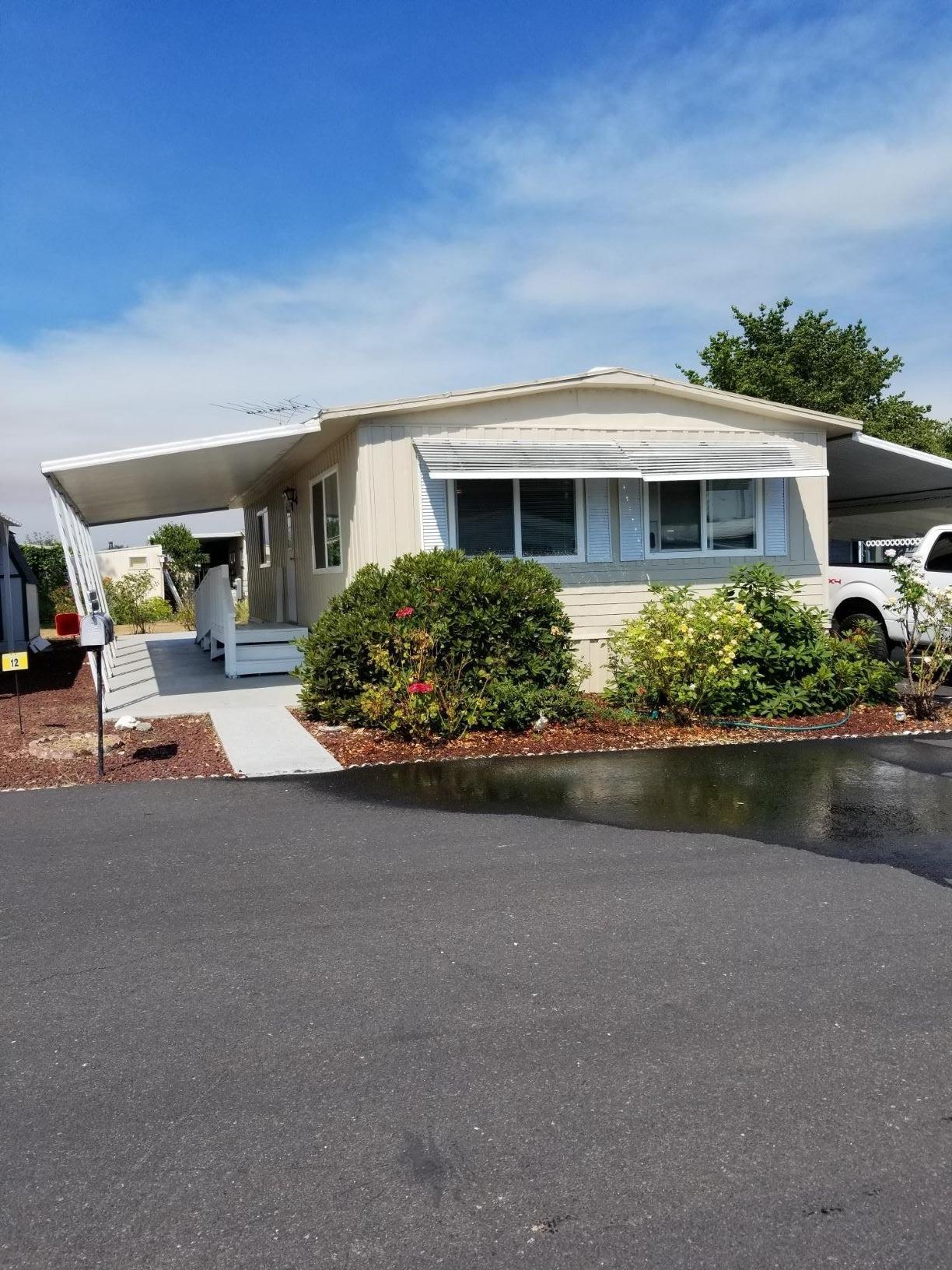 Very clean 2 bdm, 1 ba, double-wide in choice park with Rogue River access. Laminate floors, double pane windows. Some furnishings included, see remarks, also garden shed. For info purposes only. Mfg home only. No land included. OR BCD dealer lic required to list/sell.