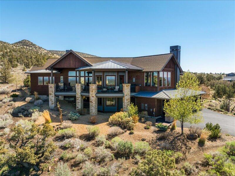 Experience the Brasada Lifestyle in this 4 bedroom, 3 bath, 4145 sf timeless mountain retreat located on the coveted Hat Rock Loop. Designed for comfort, spacious living, this home showcases breathtaking, unobstructed views of the Cascade Mountains. The lot provides potential for an ADU or Casita, offering both privacy and flexibility. Thoughtfully designed, it includes a built-out elevator ''shaft'' for future accessibility. Throughout this home, tasteful materials enhance the elegant yet inviting atmosphere, creating a timeless blend of style and comfort. There are quartz counters, a Wet Bar with mini refrigerator and ice maker, MBR- Air Massage tub, large shower with two sets of Dual Shower Systems, nine carbon monoxide & smoke detectors work in unison. Brasada Ranch is a gated community with 24 hour security surveillance.  Appliances include LG washer & dryer, monogram Avantium convection/microwave.