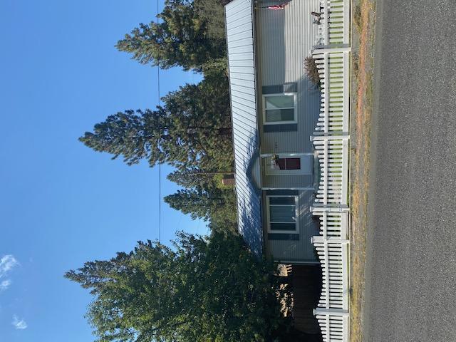 PRIDE OF OWNERSHIP!  Canyon City home on .46 of an acre w/curb appeal, 2443 sq ft w/finished basement, 3 bedroom, 2 bath, beautifully upgraded kitchen w/island seating, computer hook up, Corian counter tops, Hickory cabinets, slide out drawers, appliance garage, heightened dishwasher, range w/convection oven & pantry cupboard, dining room features Wainscoting, counter space for entertaining & pantry shelving, living room upstairs has a large custom built display shelf, utility room w/tile flooring, pantry shelving & counter for folding clothes or crafts, remodeled master bath w/vanity, walk in shower & walk in closet, basement features 2 office space areas, 1 bedroom, family room w/woodstove,  mechanic room w/forced air furnace, oil furnace, vinyl siding & windows, sidewalks, landscaped w/drip system in flower beds, wood fence in the back, white vinyl fencing in the front, covered wood shed, gravel drive, detached 3 car garage w/shop area & concrete floors.  $253,000 #1042