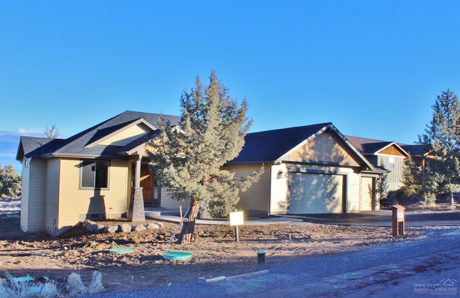 Beautiful new construction Ken Thomas home in the Ridge at Eagle Crest. Single story 2212 sq ft home with 3 bed/2.5 bath. Located on .3 acres with terrain views. Office/Den room included. Open floor plan perfect for entertaining. Kitchen with stainless steel appliances and beautiful tile backsplash. Gas fireplace in living room. Carpet, tile and wood flooring. Walk-in closet in the master bedroom. Triple attached garage with plenty of space to park toys. Enjoy the outdoors from a large back deck