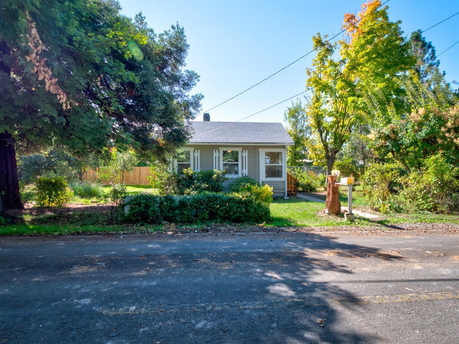 This darling cottage completely redone from head to toe qualifies for 100% VA or USDA Financing. Outside find ample garden areas, new exterior paint, new windows and a nearly new roof installed in 2017. Inside the kitchen includes new countertops, new stainless steel appliances and new vinyl floors. The bathroom was completely reimagined with new toilet, new vanity, new vinyl and a new tile shower. The living areas include new carpet, new light fixtures and new interior paint. Newly added insulation, a ductless mini-split system for heating and cooling, and a tankless hot water heater, combined with current annual property taxes of just $1,108, make this an exceptionally affordable home . Less than 1,000 feet from the Phoenix Public Library and 1/3 mile from downtown Phoenix, this centrally located cottage is the best it's ever been! Come tour today!