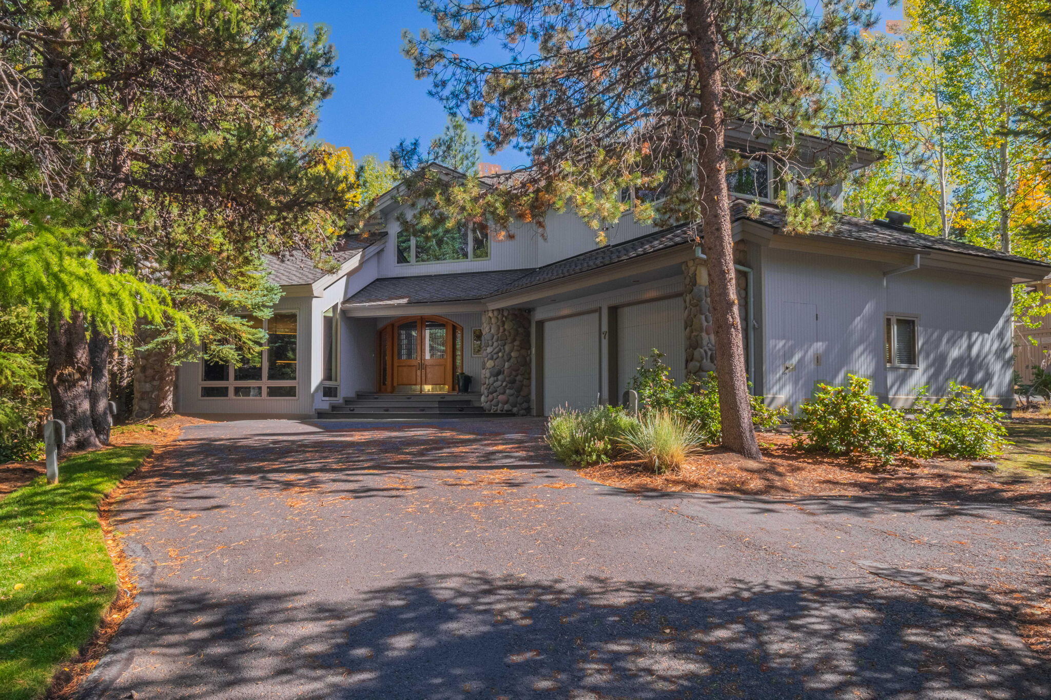 Welcome to this stunning Steve Madsen custom-built home in Sunriver, Central Oregon's Premier Residential and Resort community. Main floor living areas, then unwind in your secluded primary suite, boasting an updated lavish spa-inspired bathroom ensuite with standalone tub, spectacular walk-in tile shower, private work out area, balcony and enviable walk-in closet. Guests enjoy 2 additional bedrooms on the main connected by a Jack & Jill bath, with private sinks all their own. An inviting living room with gas fireplace, dining room surrounded in custom display cabinetry and contemporary elements, and in the kitchen a gas Wolf cooktop, Bosch dishwasher and Sub Zero retrig all ideal for entertaining. Second office on the main. Plus more sq ft. Enjoy the outdoors in the secluded forest/ landscaped yard, water feature waterfall /pond attracts an abundance of wildlife. Spacious deck and new hot tub create an ideal outdoor lifestyle. Your visit or vacation might just turn into a lifetime!