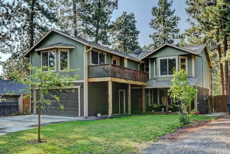 Completely remodeled home in desirable NW BEND. Walk to river, downtown, Westside Shops, Old Mill and lots of Trails! This open concept home has many upgrades with a large kitchen w/slab granite counters, inviting island w/breakfast bar, custom cabs, custom lighting, radiant floor heating, custom barn wood floors, large private back yard w/paver fire pit and built in deck for hot tub. Upstairs has 4 bed. with 2 master suites and 3 baths. Custom barn wood entertainment center with 20K stereo system.