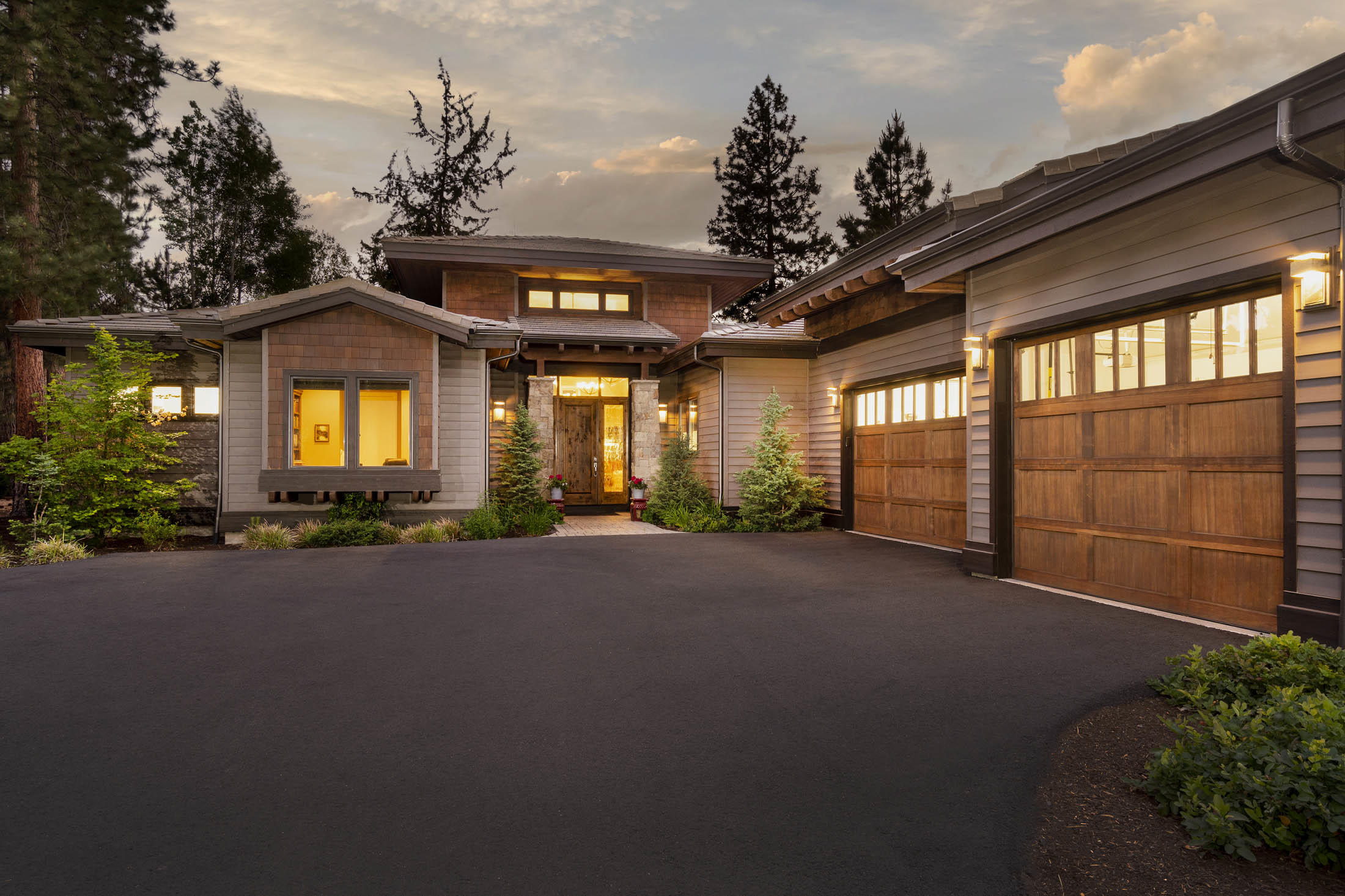 Experience the tranquility and beauty of this Contemporary Northwest style home nestled among towering Ponderosa Pine trees and a lush green-belt. Upon entering you are embraced in a spacious Great Room, complimented by vaulted ceilings, dramatic fireplace, a wall of windows which brings the serenity of nature inside, and gleaming wood flooring. The attention to detail and exquisite interior selections throughout add to the warmth and charm of this custom quality-built home in one of Bend's premiere golf course communities, Broken Top. Enjoy the ease of one level living and professionally landscaped low-maintenance grounds.