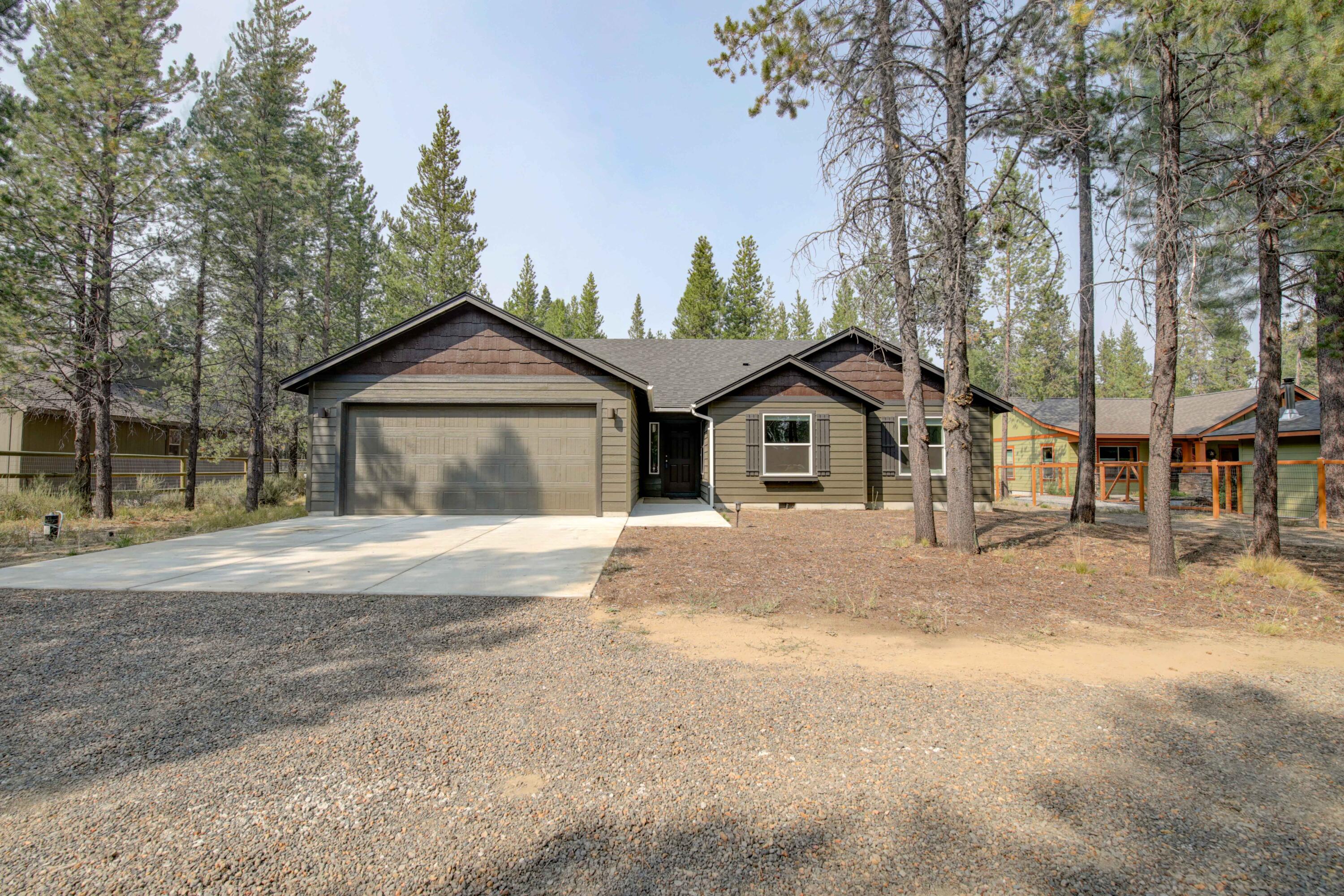 Quality newer construction with stylish thoughtful finishes and attention to detail throughout! The home is only 2 years old and is situated perfectly on a natural .55 acre lot. The home is the Pacific floorplan from Simplicity Homes and features large pantry, open great room, 3 bedrooms, 2 baths, office/media room and is 1805 sq. ft. with full RV hook ups just minutes from lakes, trails and all that Central Oregon Recreational Paradise has to offer. Ski Mt. Bachelor in the winter or paddle board the Big Deschutes in the summer and then end your day relaxing at one of the many restaurants in Sunriver Village or strolling the many shops. This neighborhood has deeded boat ramp river access and adjacent to miles of forest trails.
