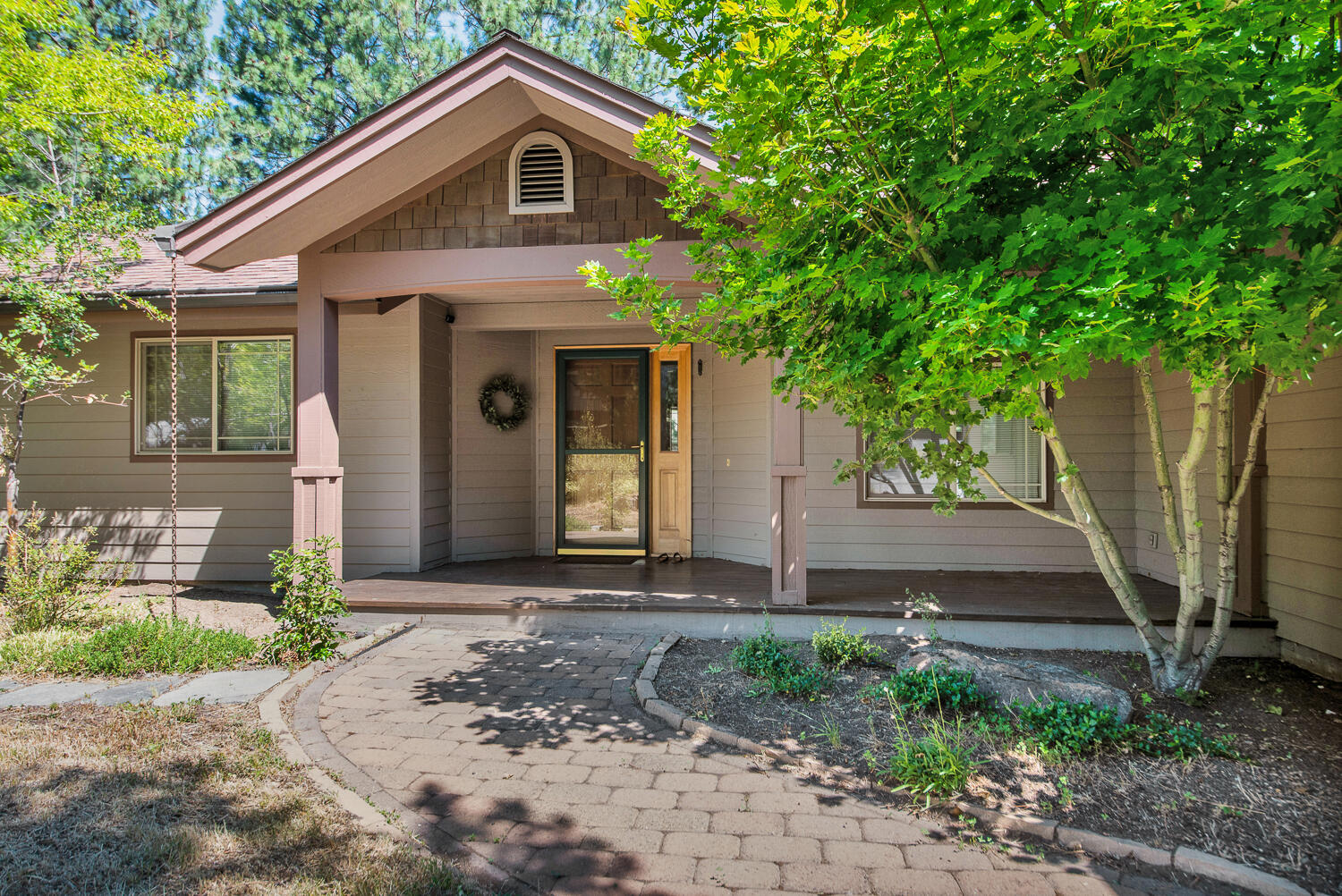 Located on a quiet street in sough-after Awbrey Glen resides this newly updated single-level home on a serene 0.32 acre lot. The gorgeous contemporary kitchen was completely redesigned and updated w/new cabinetry, open shelving, quartz counters, undermount sink, lighting, stainless appliances, and tile flooring. The adjacent dining area with slider fosters seamless indoor/outdoor entertaining on the large partially covered back deck. The living room boasts a vaulted ceiling, gas fireplace flanked by built-ins, slider for deck access and adjacent office w/barn doors. The primary bedroom with en-suite bath has a walk-in closet, dual vanities, jetted tub and shower. Additional updates include a remodeled laundry room, new powder bath, new carpet in the bedrooms and newer wood flooring throughout. Awbrey Glen is a private, gated Golf Course community on Bend's west side with tennis courts, pickle ball, walking paths, restaurant, pool & fitness center. Some amenities require membership.